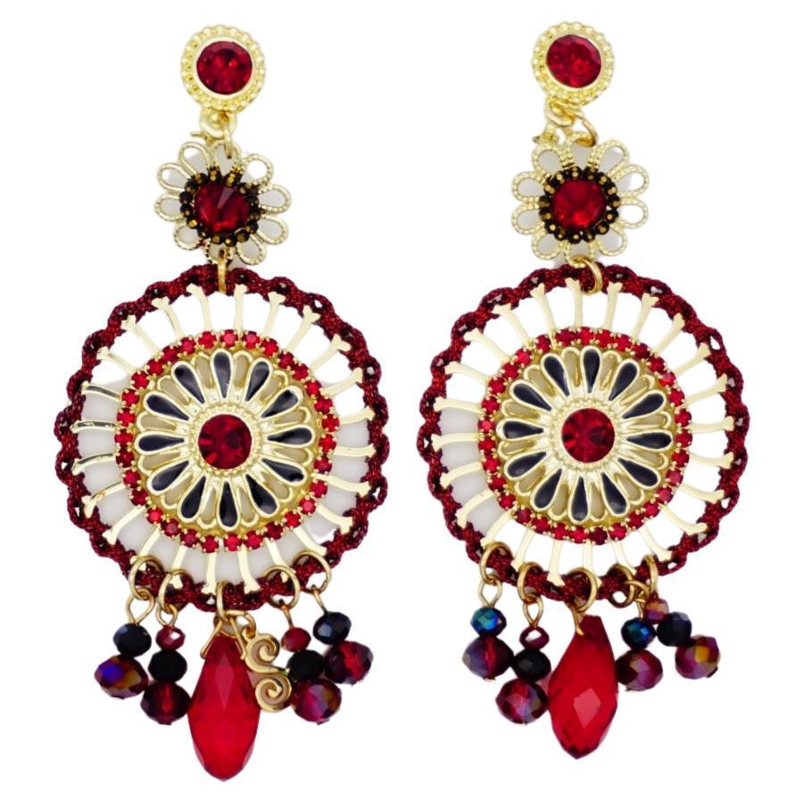 Boucles d'oreilles clip de luxe ajourées en forme de cercle de feu rouge avec pampilles de cristal noir