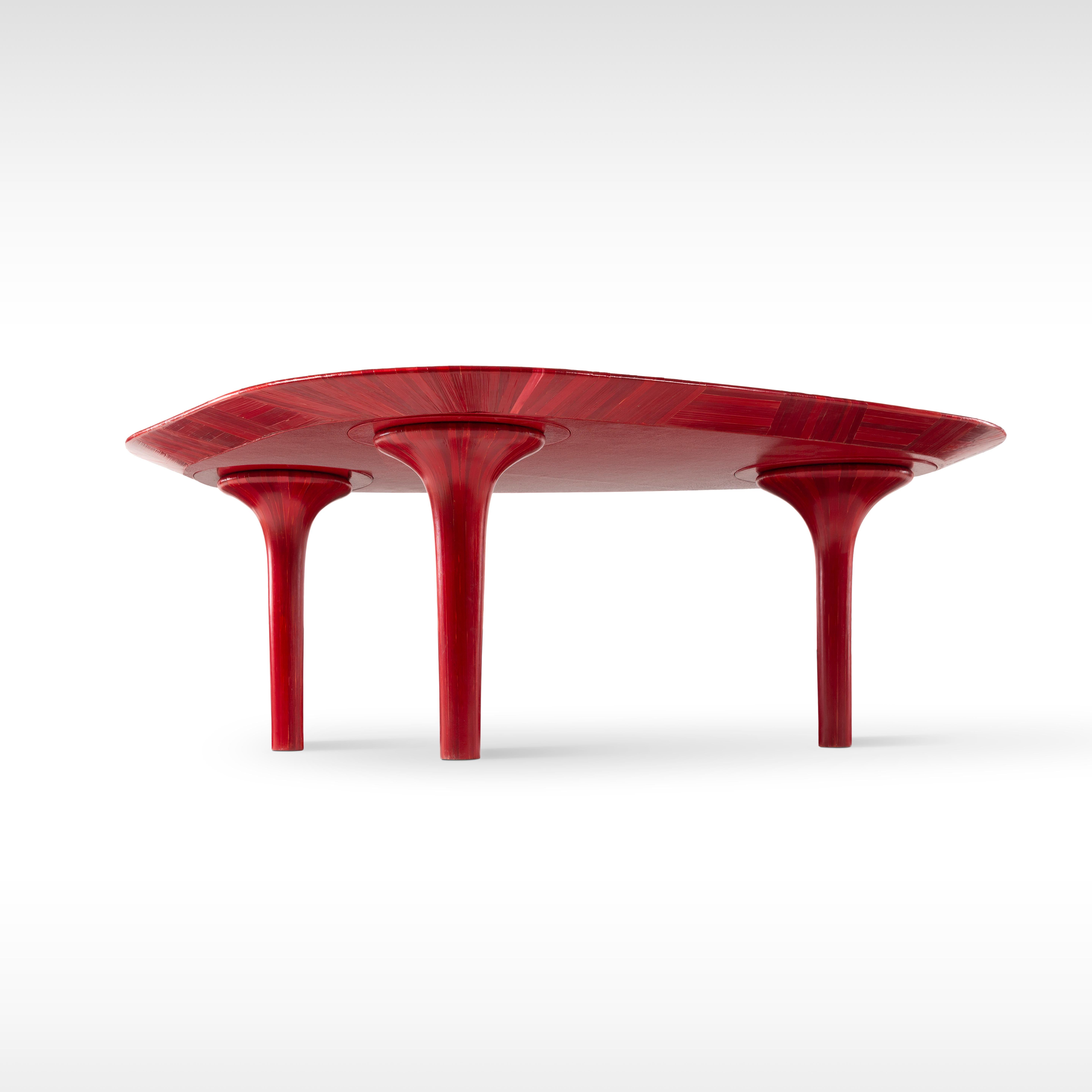 Luxury organic-shaped coffee table with hand-laid red straw.
Our Divine table design in a striking new Crimson color. With its organic lines and gorgeous vibrant color, this table is sure to be the center piece of your living area. Our signature