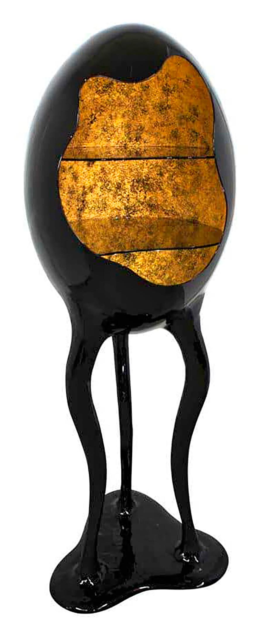 Materials and finishes:
Lacquered fiberglass reinforced resin in black high gloss and gold leaf interior.
Glass shelves and lighting.

Measures:
Height 162 cm
Width 60 cm
Depth 60 cm
Weight 26 kg.
        