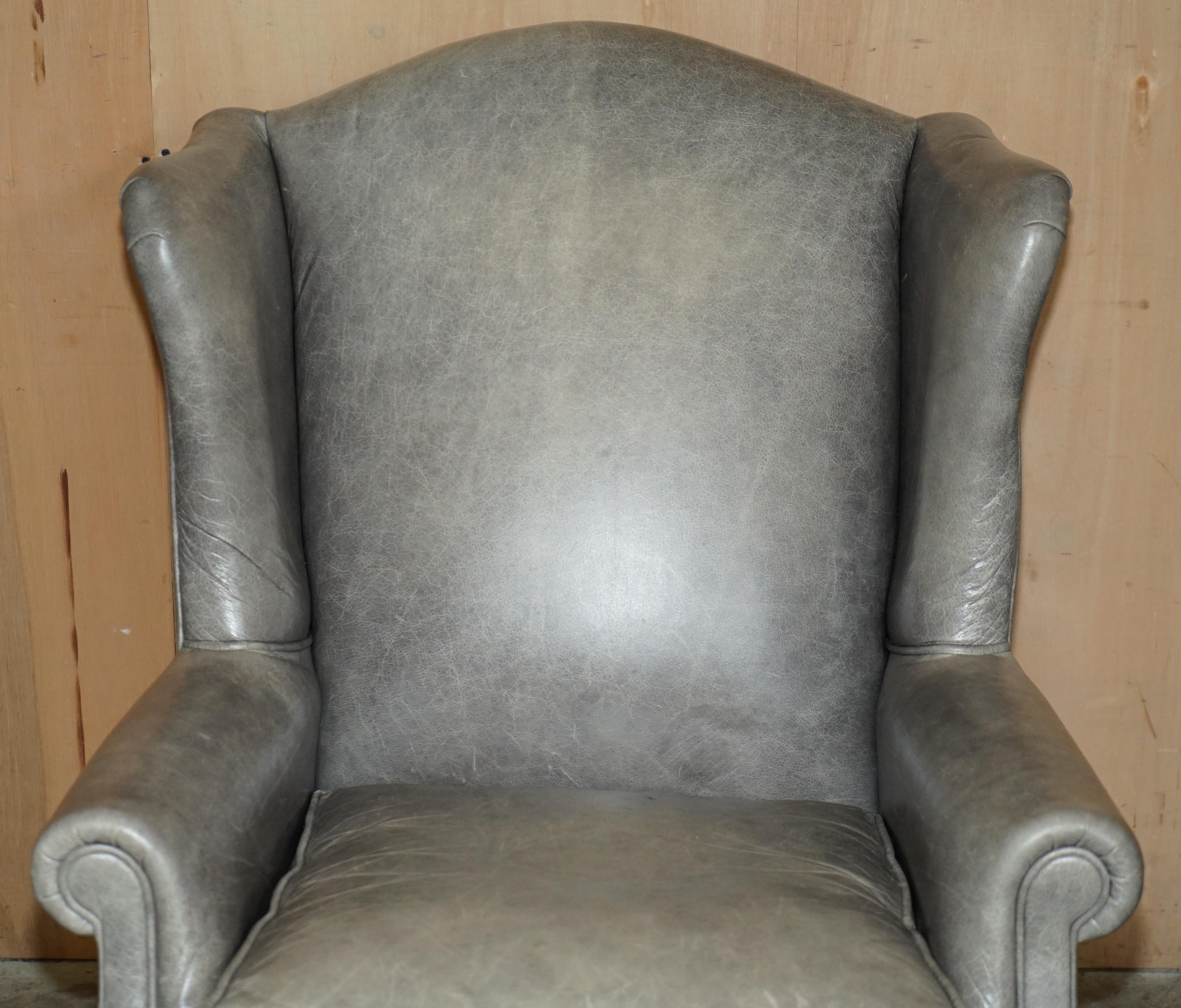 English LUXURY PAIR OF CONTEMPORARY GREY BLUE LEATHER WINGBACK ARMCHAIRS EBONISED LEGs For Sale