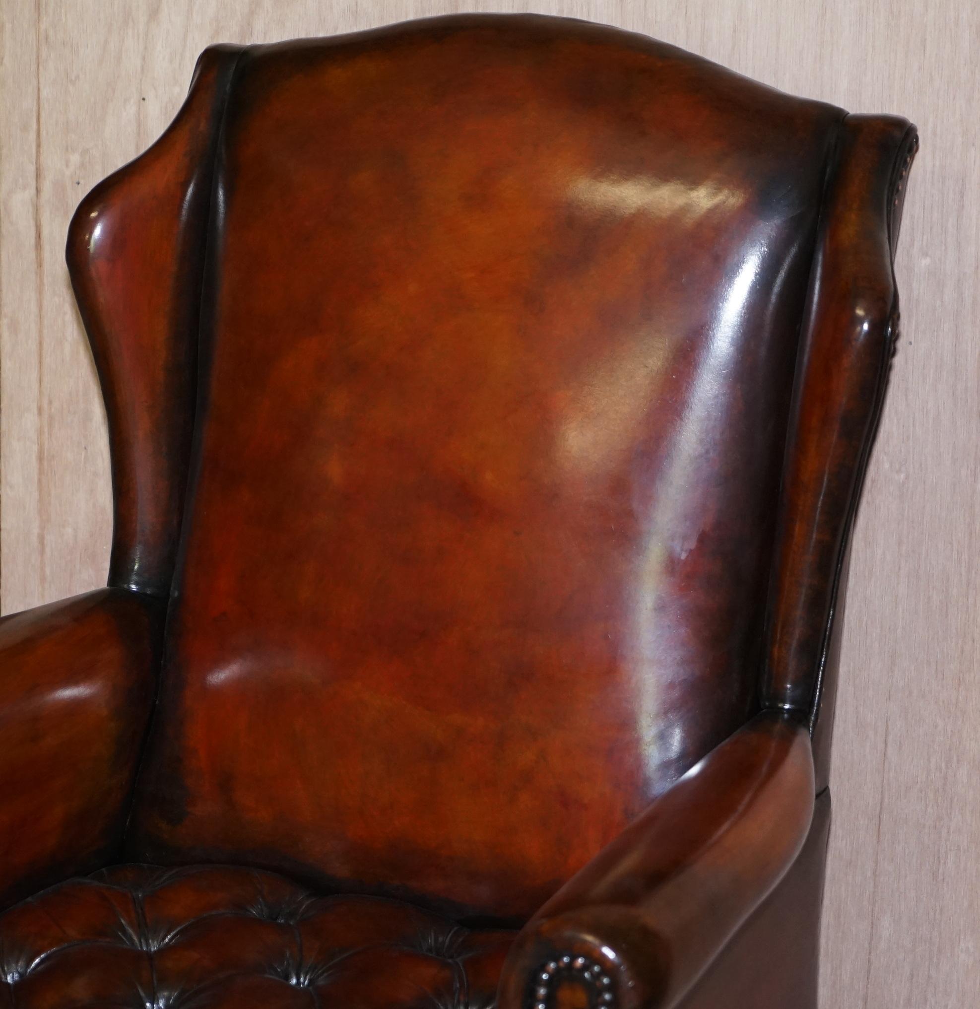 English Luxury Pair of Restored Hand Dyed Brown Leather Chesterfield Wingback Armchairs For Sale