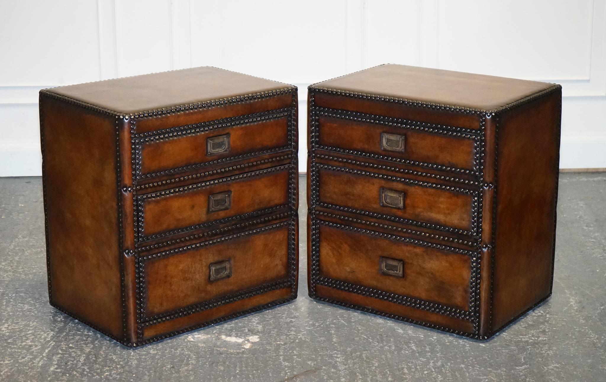 
We are delighted to offer for sale this Luxury Pair Of Restored Military Campaign Hand Dyed Leather Nightstands Bedside tables or End Tables.

These tables have had their leather stripped back and hand dyed this gorgoues whiskey brown colour. This