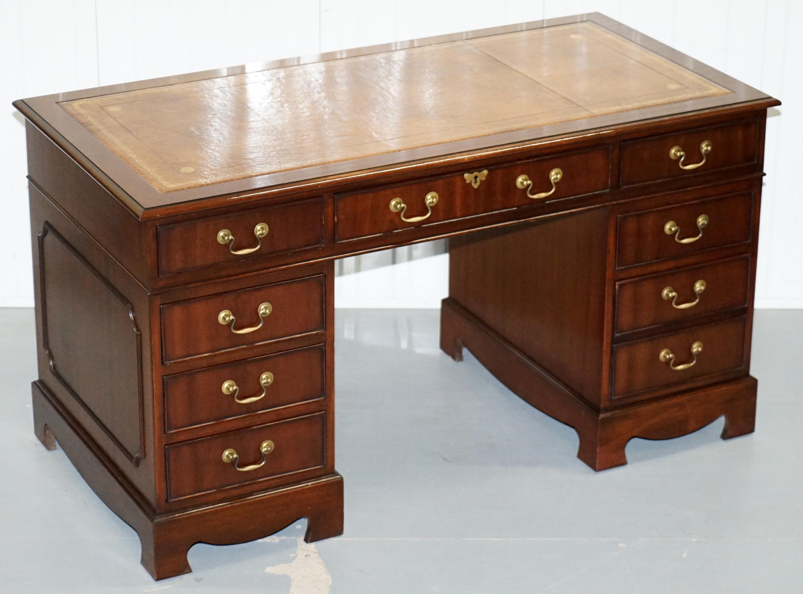 We are delighted to offer for sale this lovely luxury premium flamed mahogany with brown leather writing surface twin pedestal partner desk

This desk has the tradition drawer formation which is all standard drawers and one bottom right double
