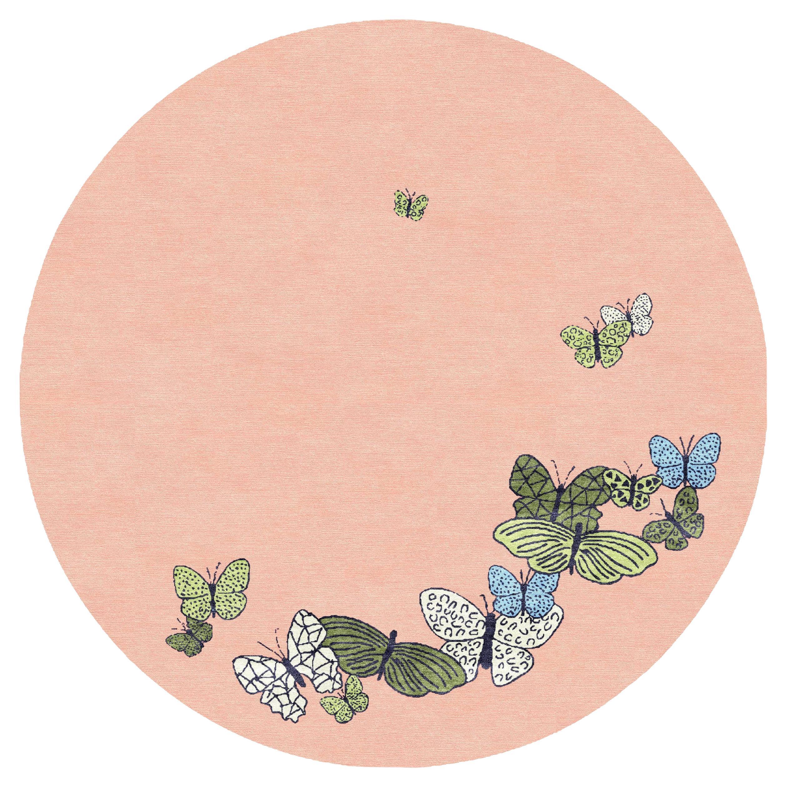 Lujosa alfombra nepalí redonda anudada a mano con forma de mariposa. Lana y seda. Melocotón