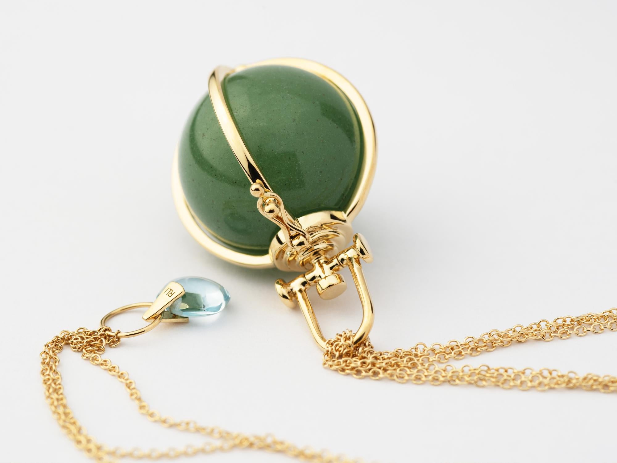 Rebecca Li designs Mindfulness. 
This bold stone orb necklace is from her Crystal Orb Collection. The main design element used is the sacred geometry circle. It represents oneness. 
Natural aventurine means manifestation, healing and
