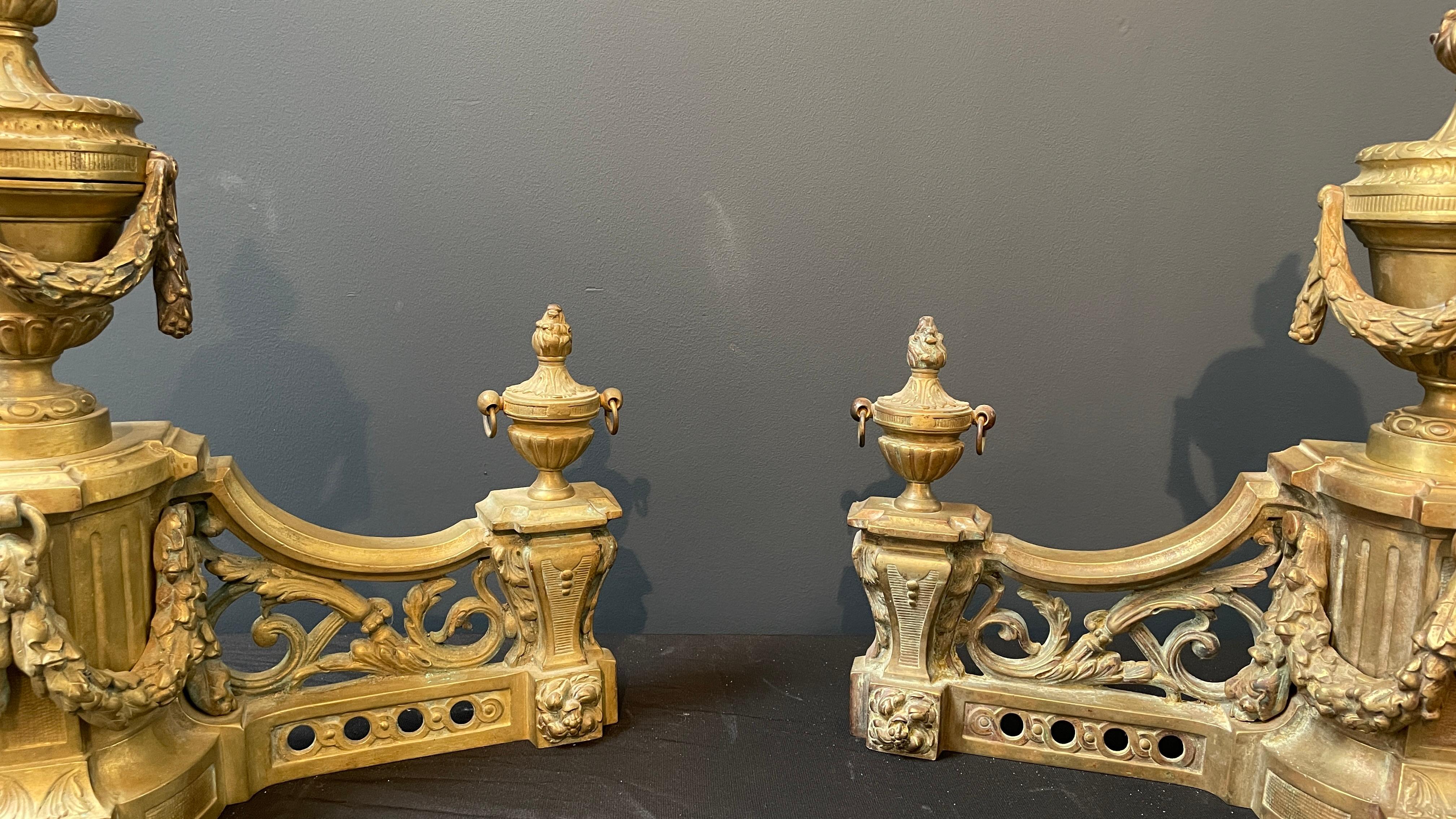 Beautiful set of antique French brass firebombs. The details on these items are just stunning.
 