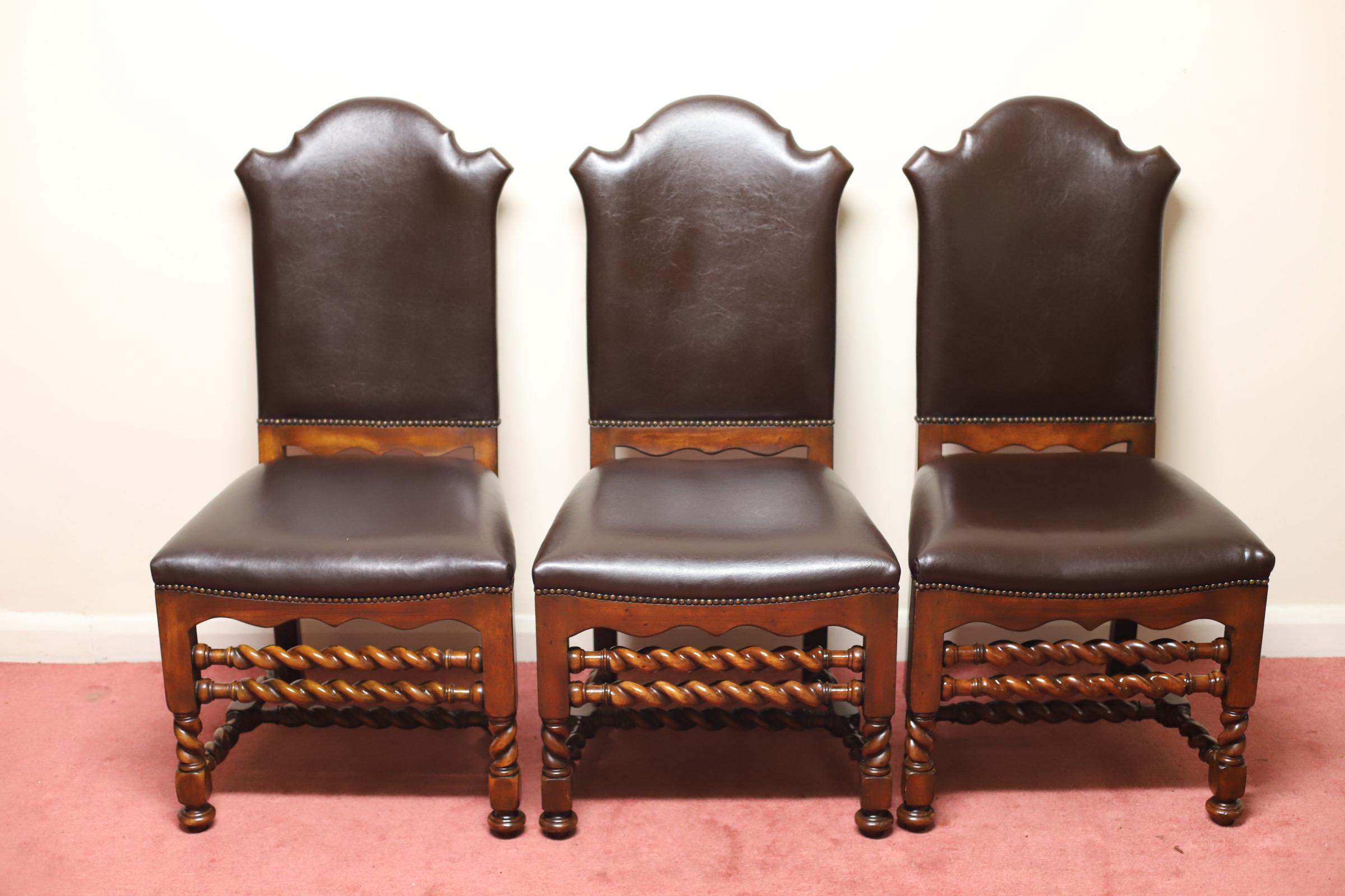 Fine set of 6 modern spiral turned chestnut dining chairs by Theodore Alexander.
The seats and backs have soft brown leather upholstery - with fire retardant safety labels attached under soft base.
Chairs have no defects, may show slight traces of