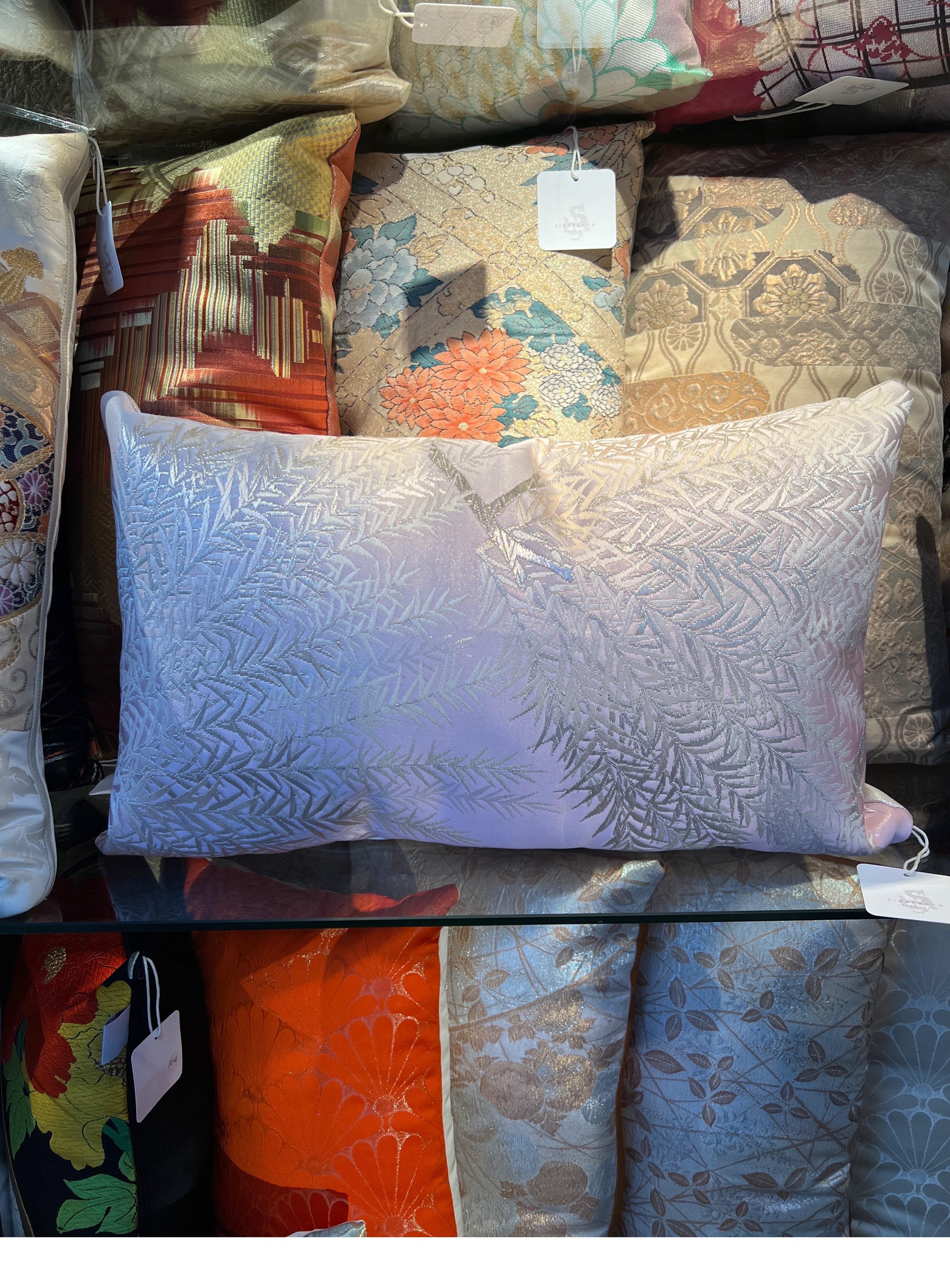 A spectacular lombar pillow wowen in pale pink and metal threads.

Buying handmade cushions from Sinapango Interiors Paris, crafted from vintage Obi silk made in Nishijin district in Kyoto Japan not only adds an elegant touch but also brings a