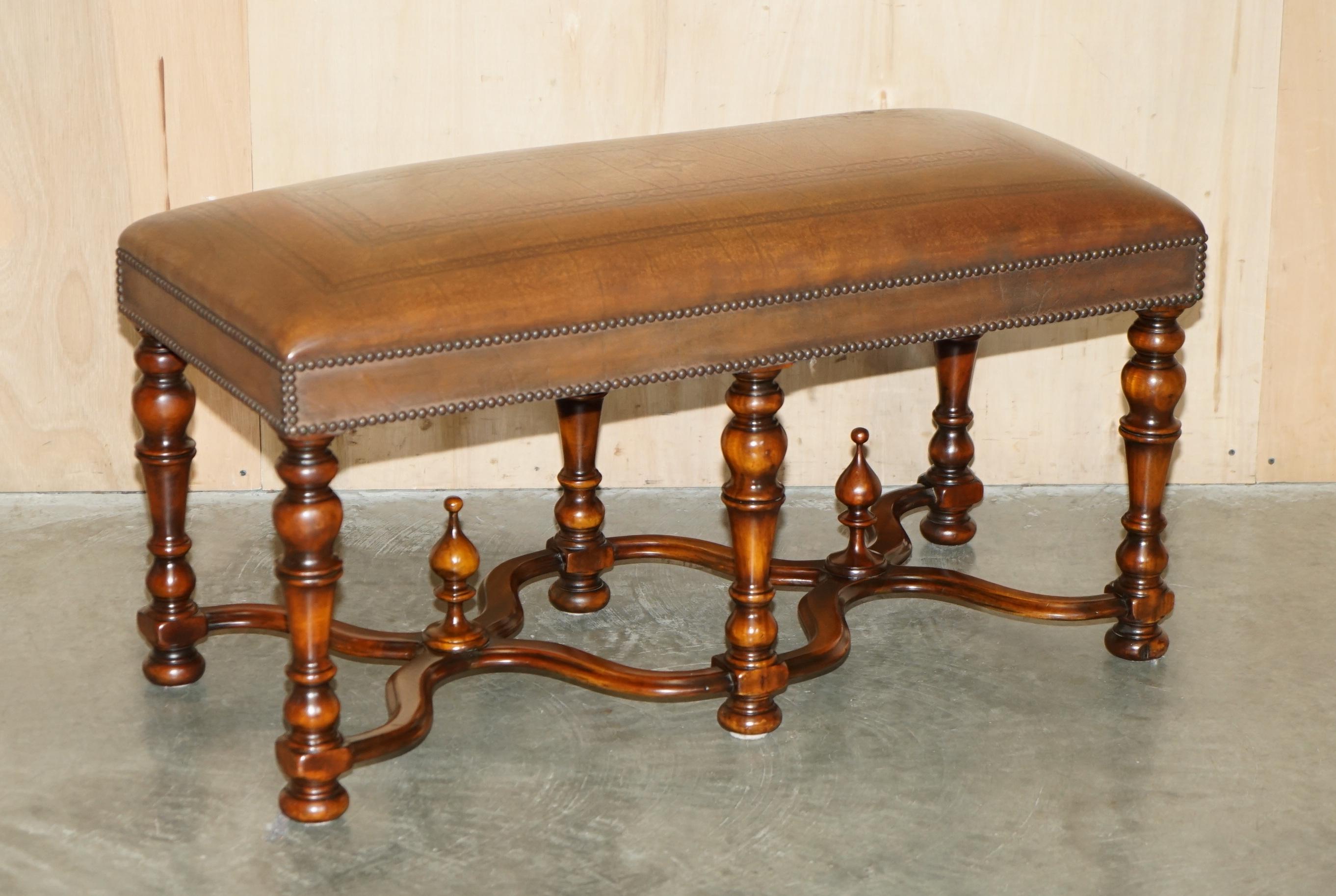 Royal House Antiques is delighted to offer for sale this absolutely stunning Theodore Alexander Embossed brown leather window seat bench 

Please note the delivery fee listed is just a guide, it covers within the M25 only for the UK and local Europe