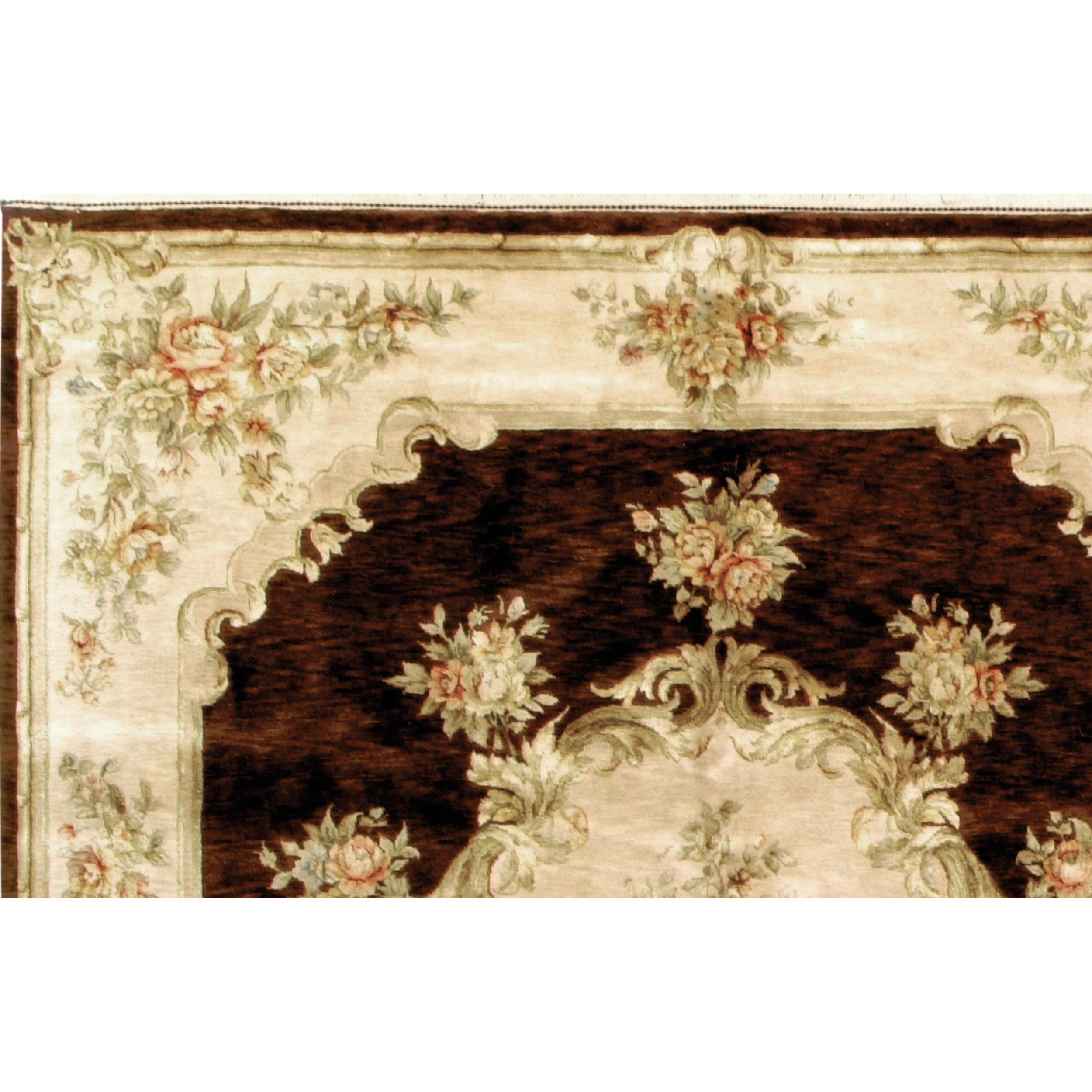 Originating from the skilled craftsmanship of China, this piece is a prime example of piled carpet artistry, seamlessly blending traditional French and European design. The ground color of this carpet is formed from the rich resilient fibers of