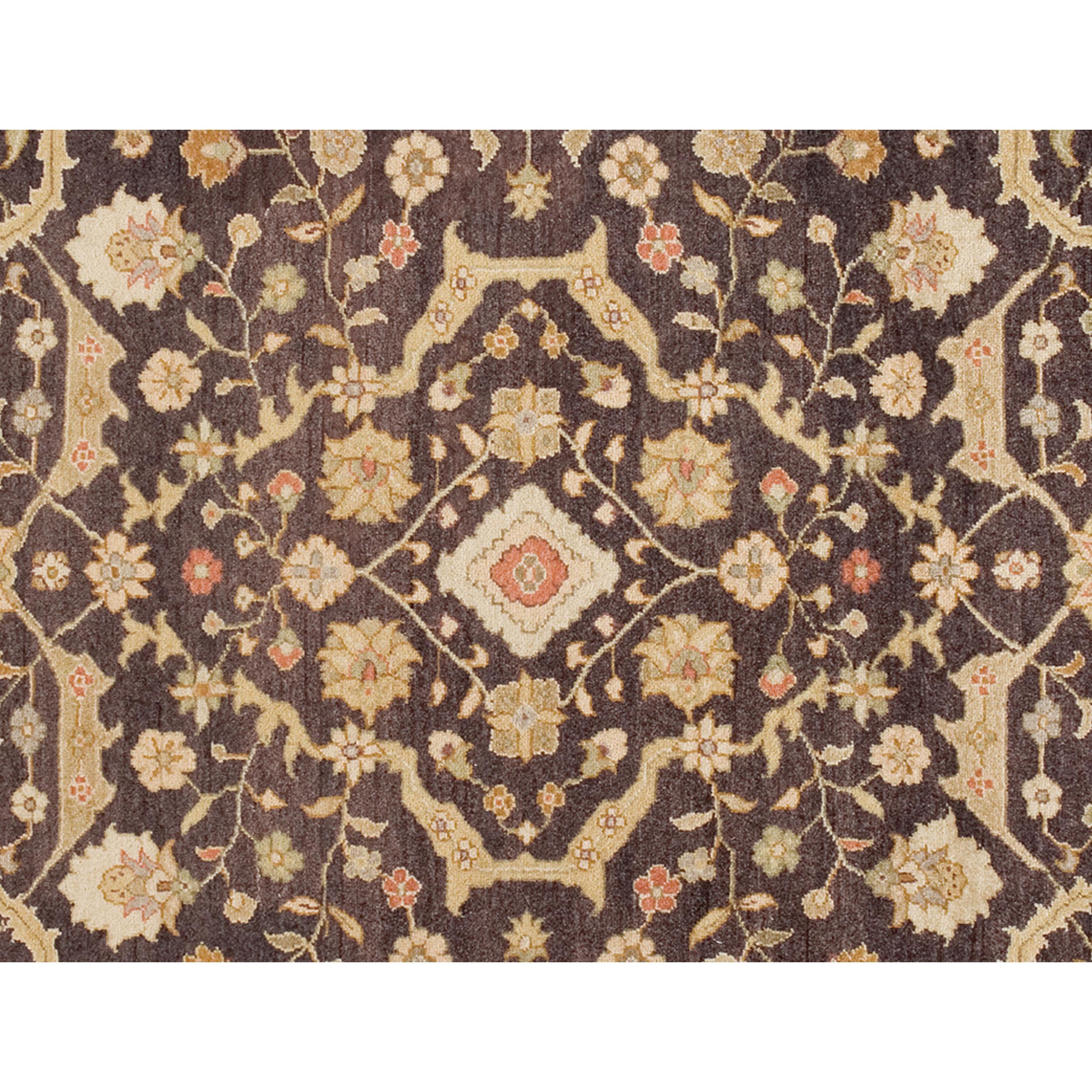 A luxurious traditional hand-knotted rug, which has been meticulously crafted, is made from the finest wool. This rug transcends its utilitarian purpose, becoming a work of art that delights the senses and harmonizes perfectly with a variety of home