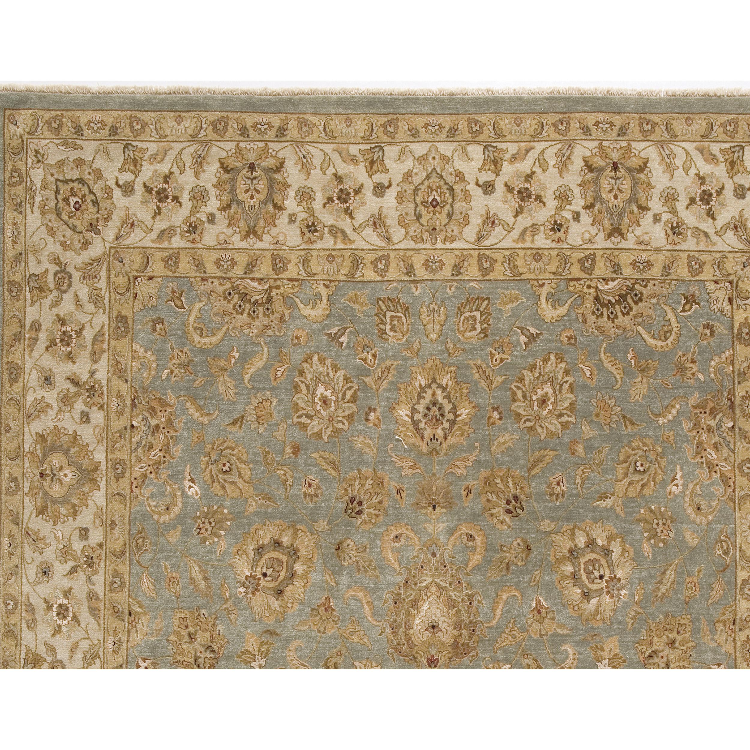 Every inch of this rug is meticulously hand-knotted by skilled artisans in India. The design reflects a traditional timeless aesthetic. Crafted from a harmonious blend of silk and sumptuous wool made up of yarn that is brilliantly colored using