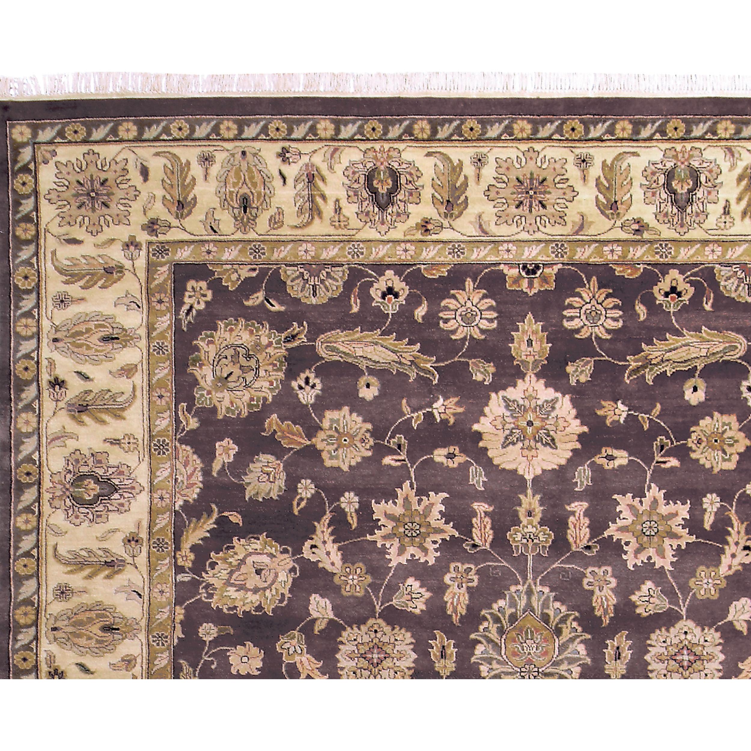 Large, exaggerated village carpet designs with a warm tonal palette. Each hue is carefully curated, contributing to a symphony of warmth that transforms any space into a haven of coziness and style. This carpet, produced in India, boasts a high