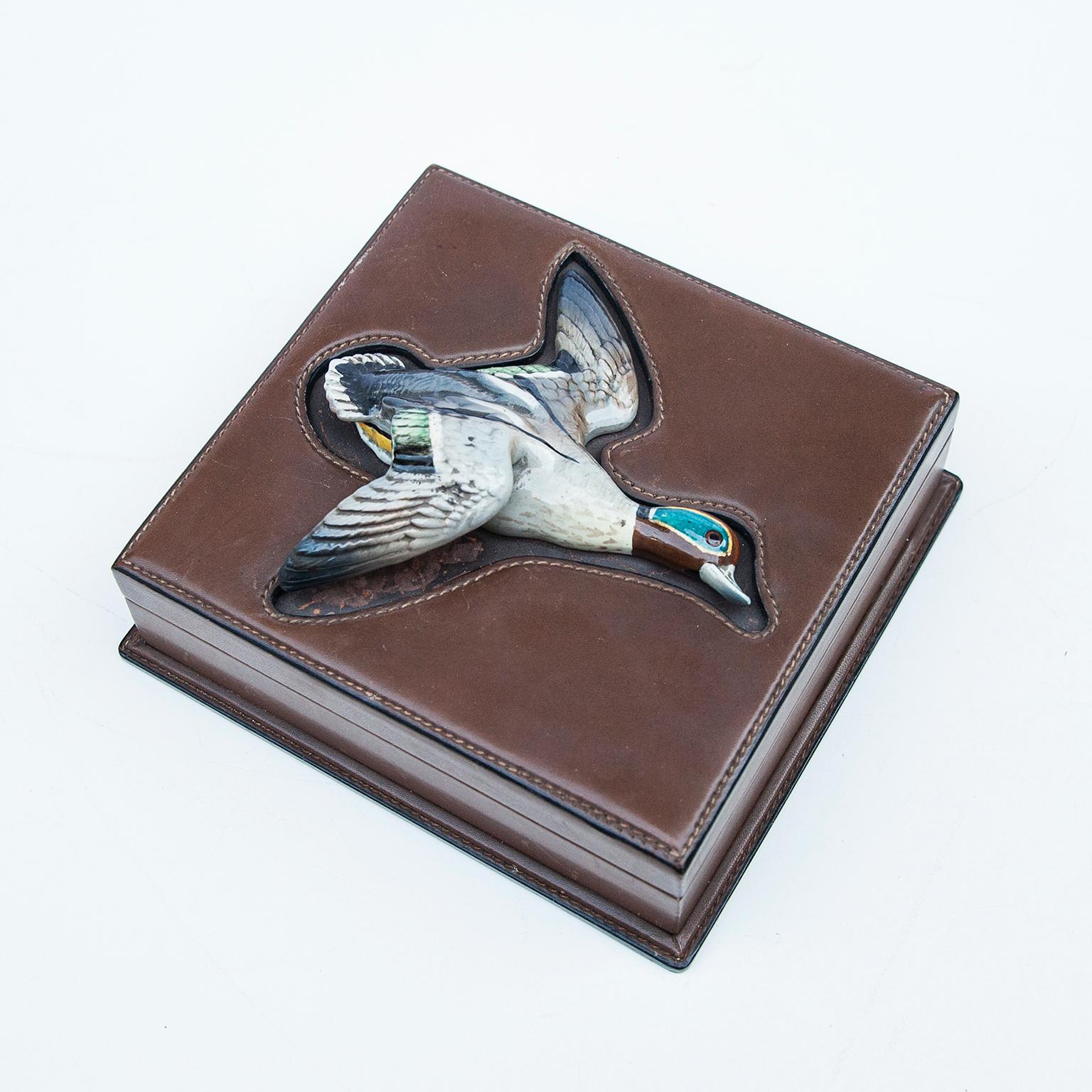 Gucci vintage brown leather box with porcelain wild duck. The box has wood internally. Gucci embossed on the bottom.
