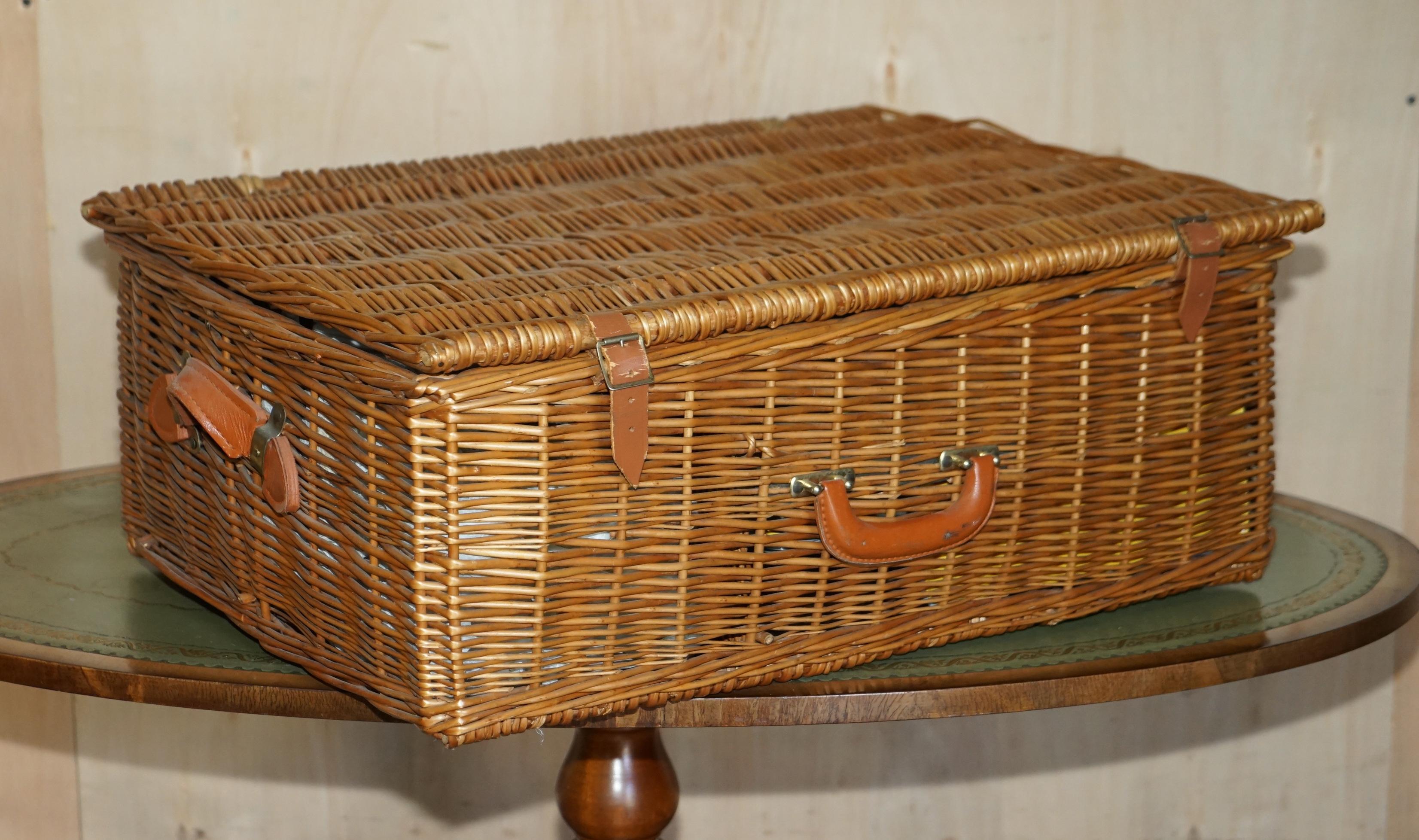 We are delighted to offer for sale this stunning Vintage large Fortnum & Mason six person wicket picnic hamper RRP £2550

A very well made and decorative hamper set by the market leaders, Fortnum & Mason, this is an unused vintage suite, the