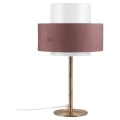Luxus, Sweden. Large table lamp in brass, shade in plastic and brown fabric.