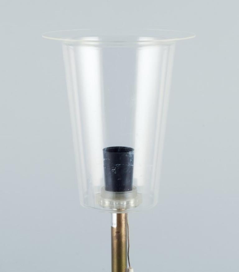 Late 20th Century Luxus, Sweden. Large table lamp in brass with shade in plastic and brown fabric. For Sale