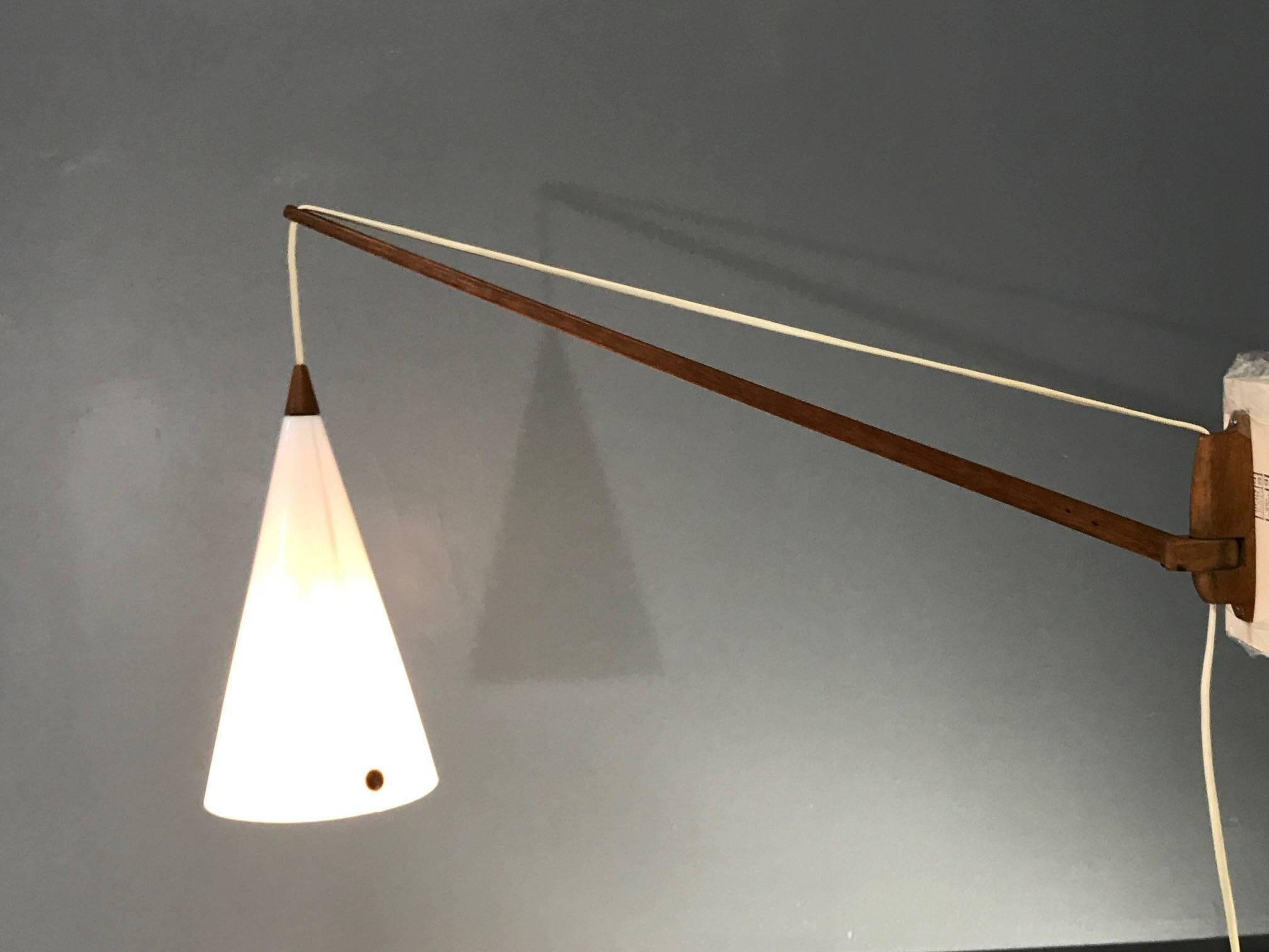 A Luxus Vittsjo swing arm lamp with the original plastic lampshade. (Designed by Osten and/or Uno Kristiansson.).