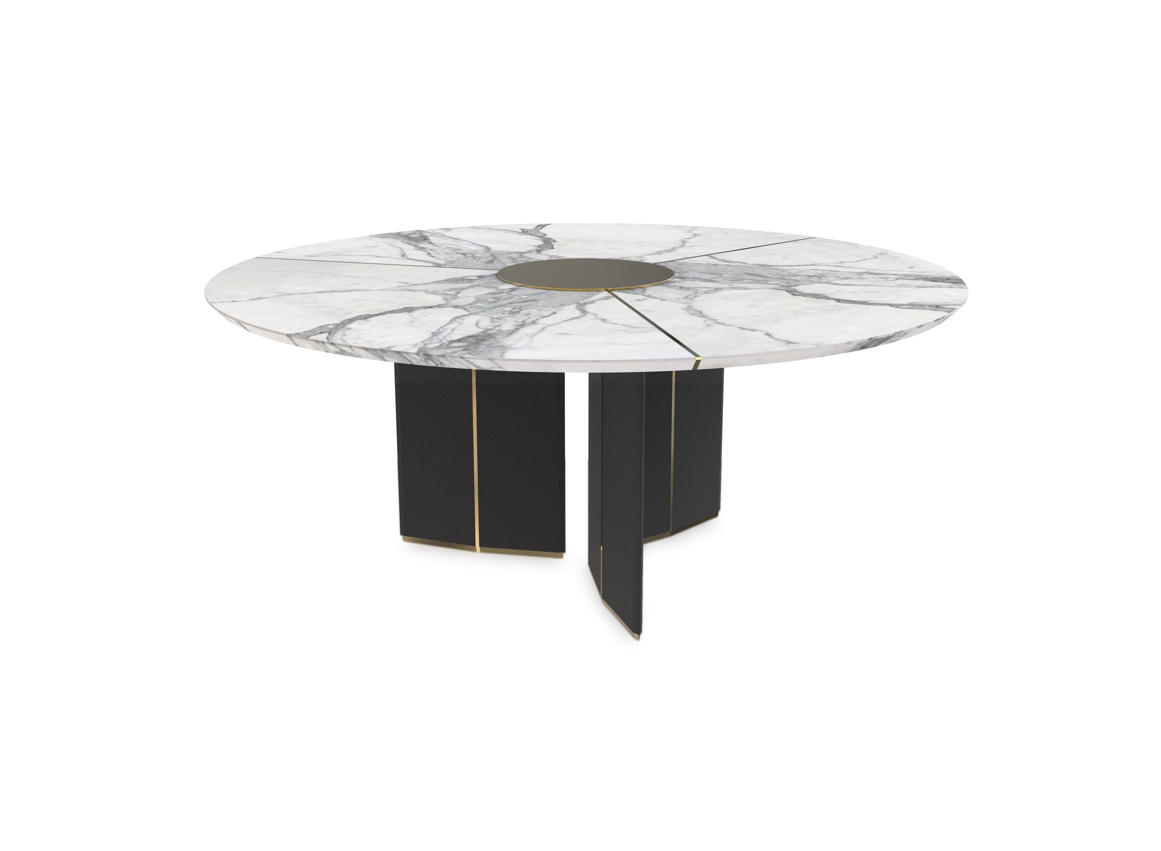 Algerone is an opulent round dining table, inspired by architectural elements, it was designed to remind us of the unique strength and class that only marble has. The Carrara marble circular top is supported by a sleek base adorned with black