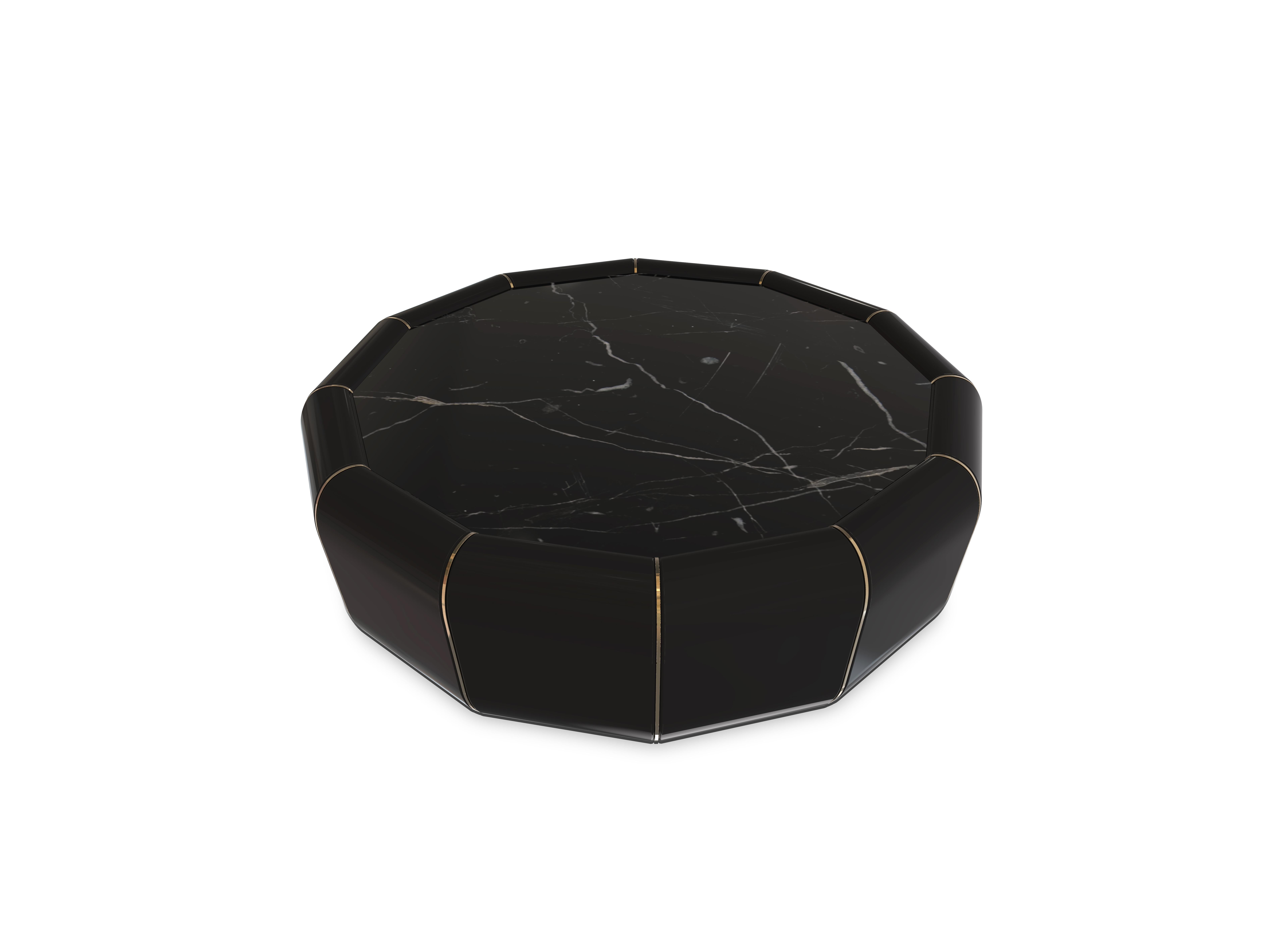 The Darian takes up a new form, this time in a lavish center table. A proof that precise knowledge and expert craftsmanship can create a luxurious silhouette. Involving the glossy black lacquered wood are fine gold plated brass lines and it’s