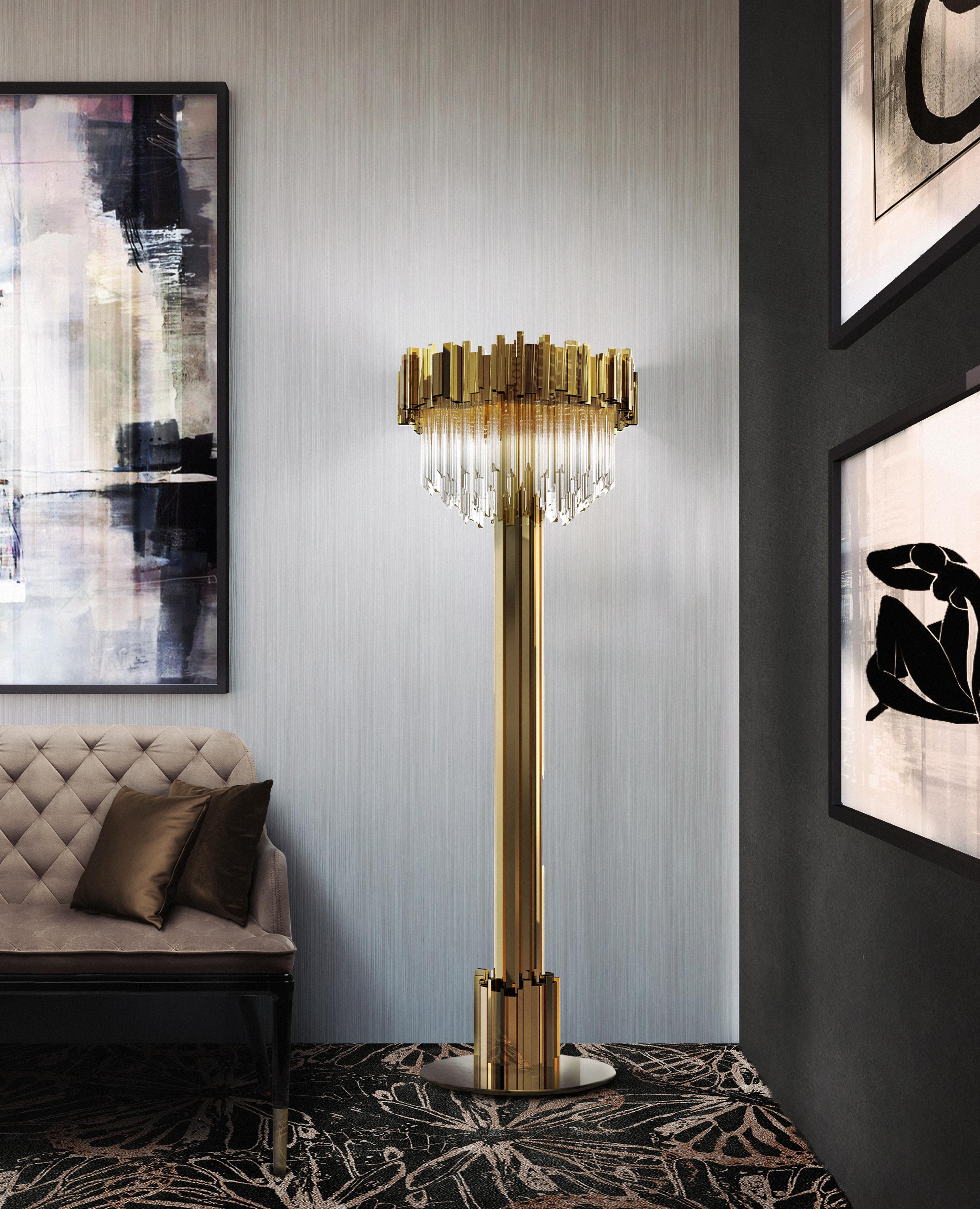 A statement floor lamp that will light up every room with its exuberant shape. Inspired by our Empire family, the Empire floor is made of crystal glass and complemented by a gold plated brass vigorous standing.
Materials: gold-plated brass and