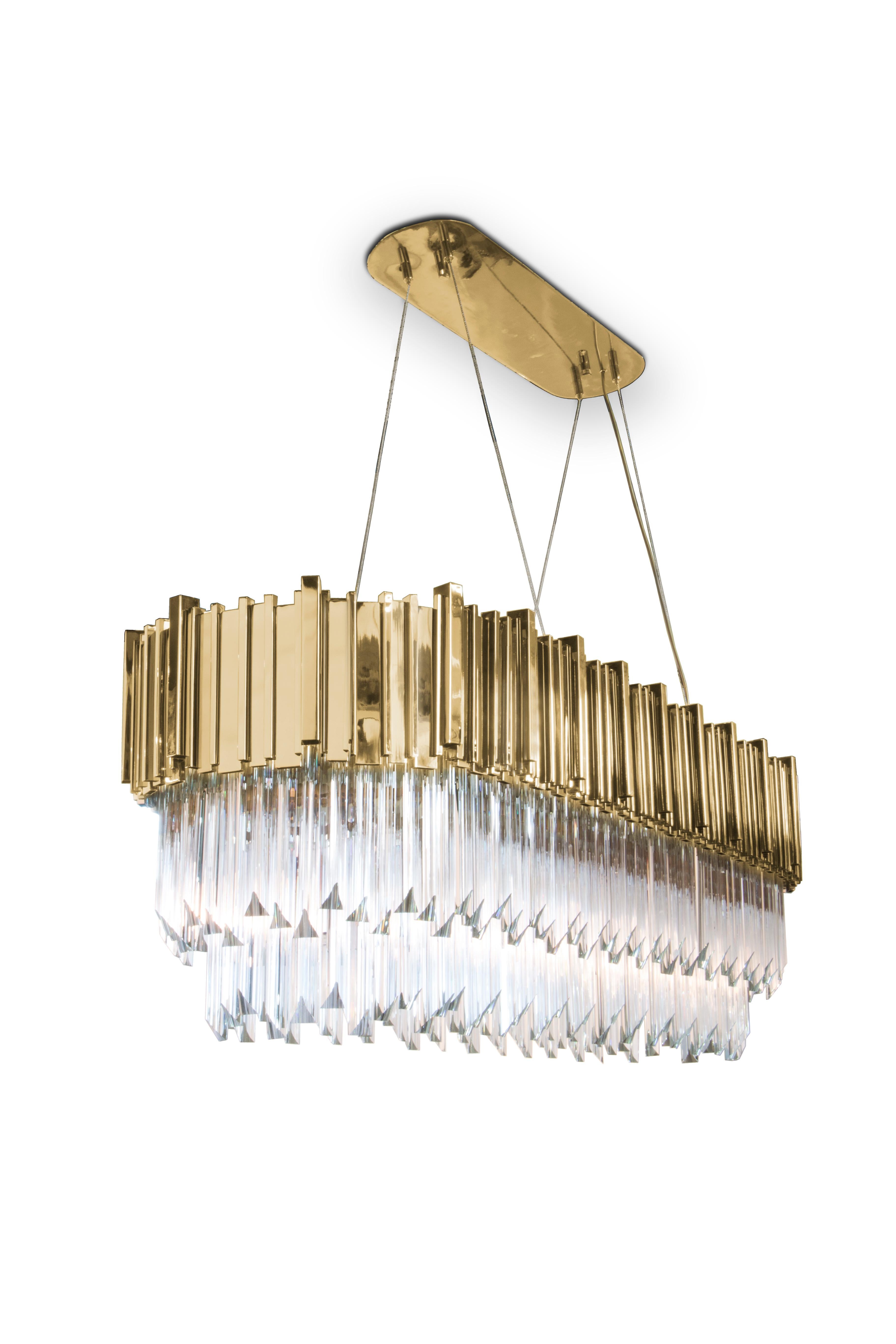 Created with crystal glass and brass, finished with gold plated, this magnificent suspension is capable of give a luxurious and glamorous look to any space. This product is a true jewelry for your decoration, creating a sophisticated and unique
