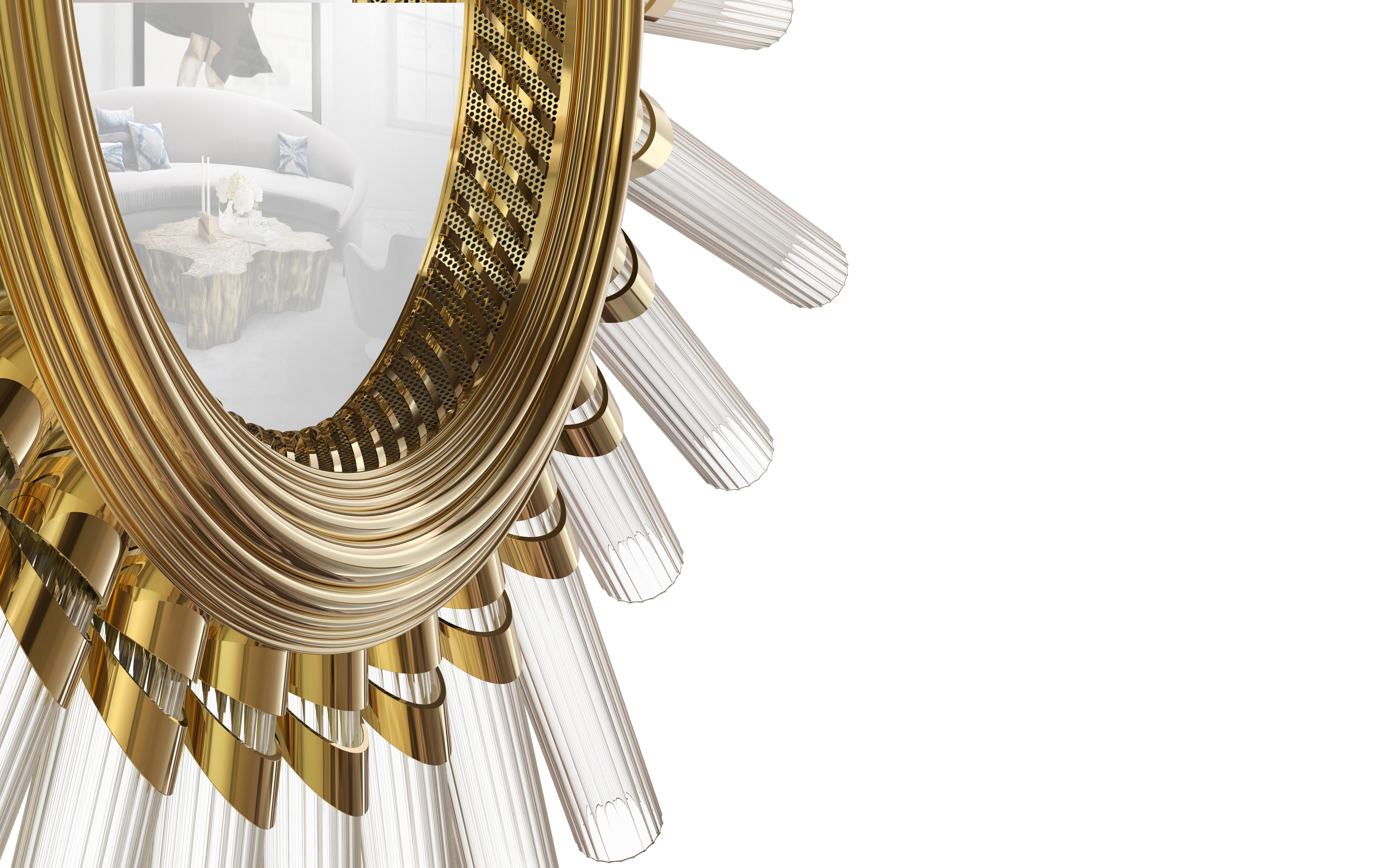 The glow takes the form of a golden plated brass circle and each of your ribbed crystal glass cylinders evokes a petrifying effect in any setting. This emancipation of lighting reflects fascinating design of the craftsmen to become a mirror of