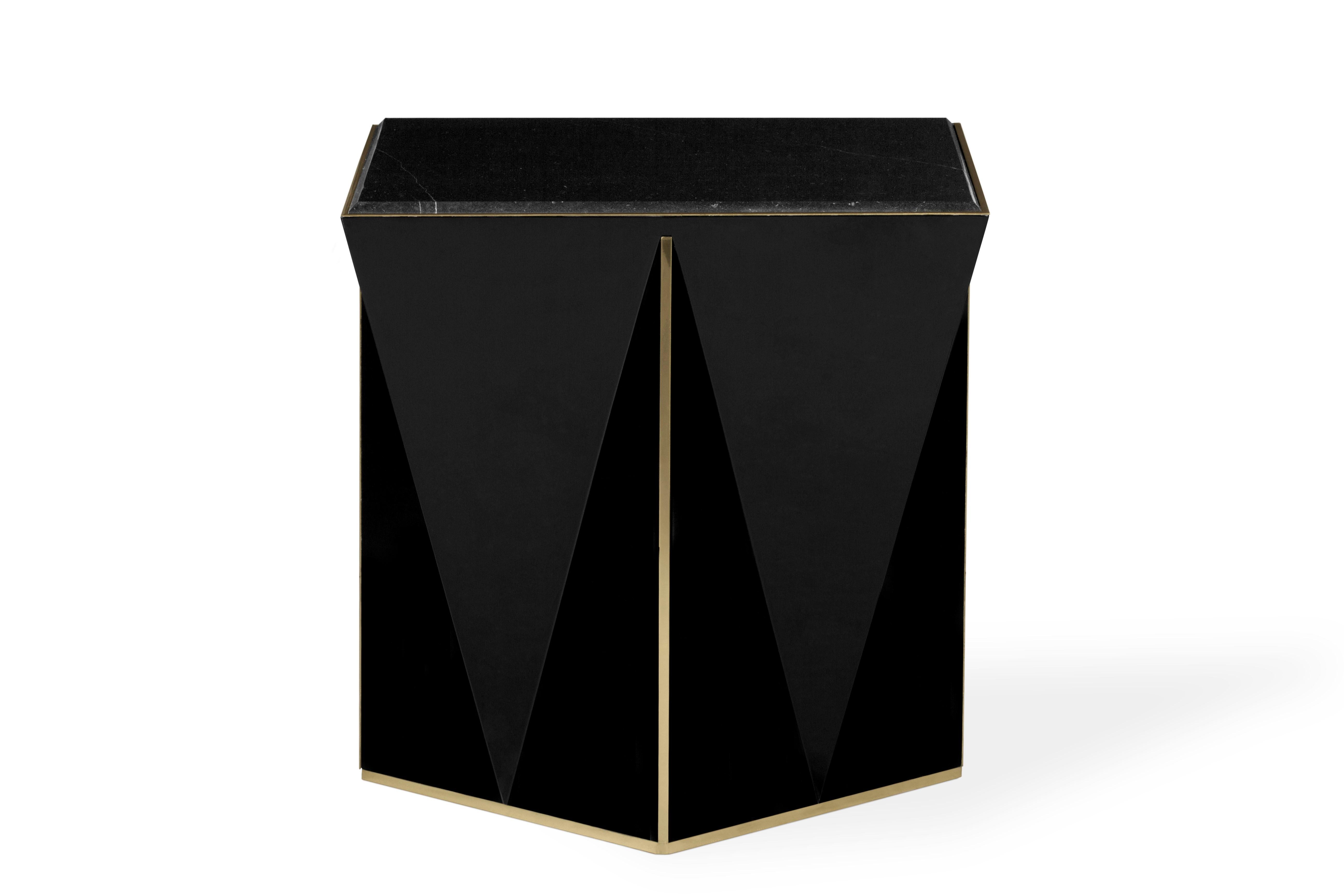 The Prisma side table conveys a spiral and passionate design that definitely seems to go beyond this world. A celestial piece handcrafted using traditional techniques and materials like black lacquer, brass and Nero Marquina marble with one purpose