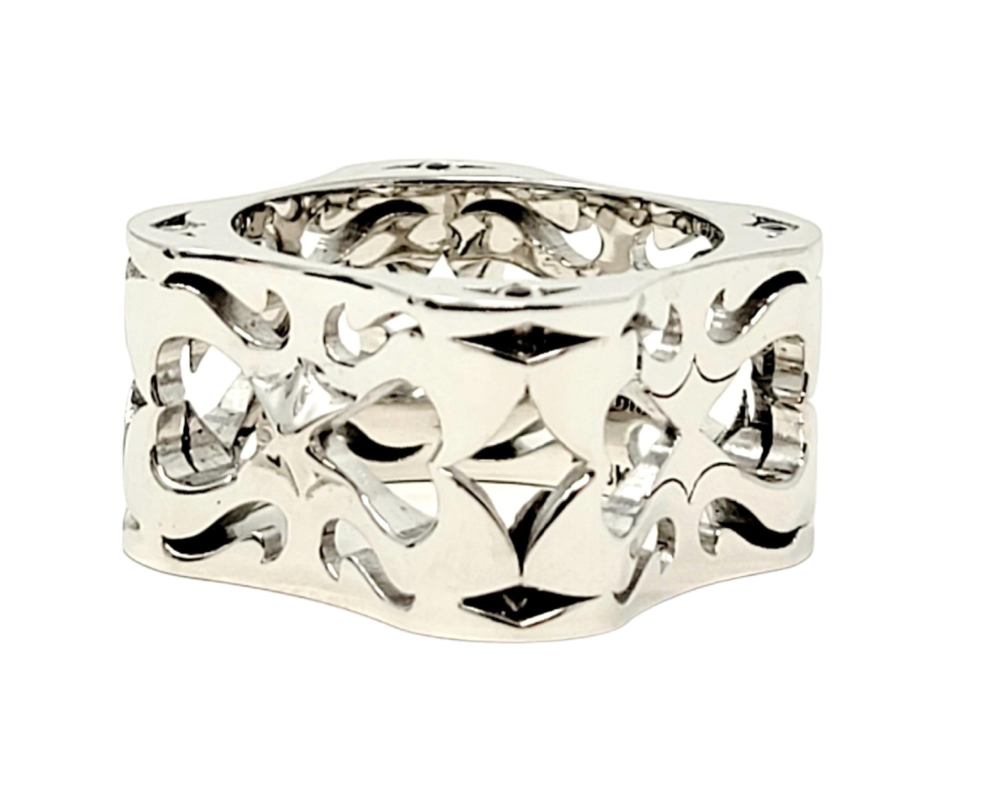 Ring size: 13

Unique unisex band ring from LUZ by Houman. Substantial in both size and design, this bold piece exudes a modern elegance. With its solid white gold design and stunning carved details, this incredible ring is truly a work of art. 