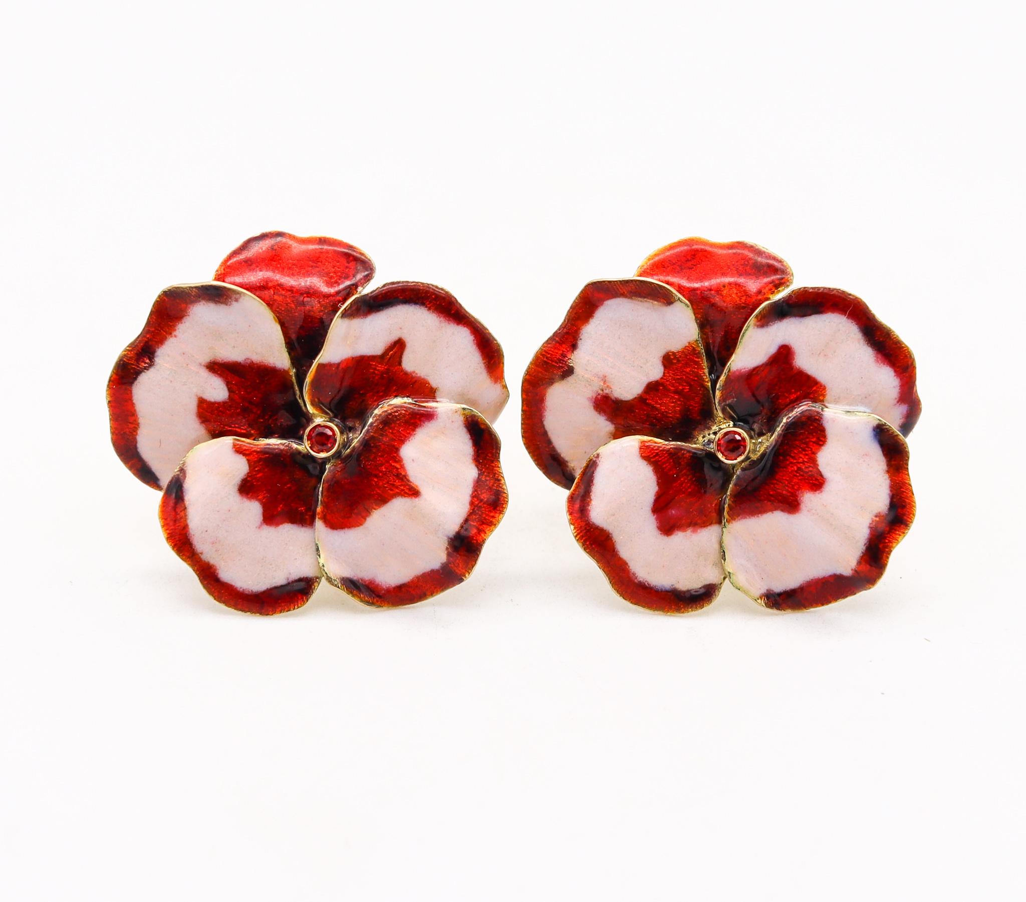 Enameled orchids clip earrings designed by Luz Camino.

A beautiful colorful pieces created in Madrid by the Spanish jewelry designer Luz Camino, back in the 1990's. These vintage pair of clip-on earrings has been designed in the shape of