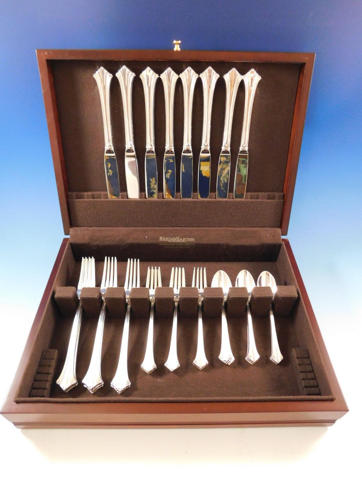 Dinner size Luzon by Tuttle sterling silver flatware set, 32 pieces. This set includes:

Eight dinner size knives, 10 1/4