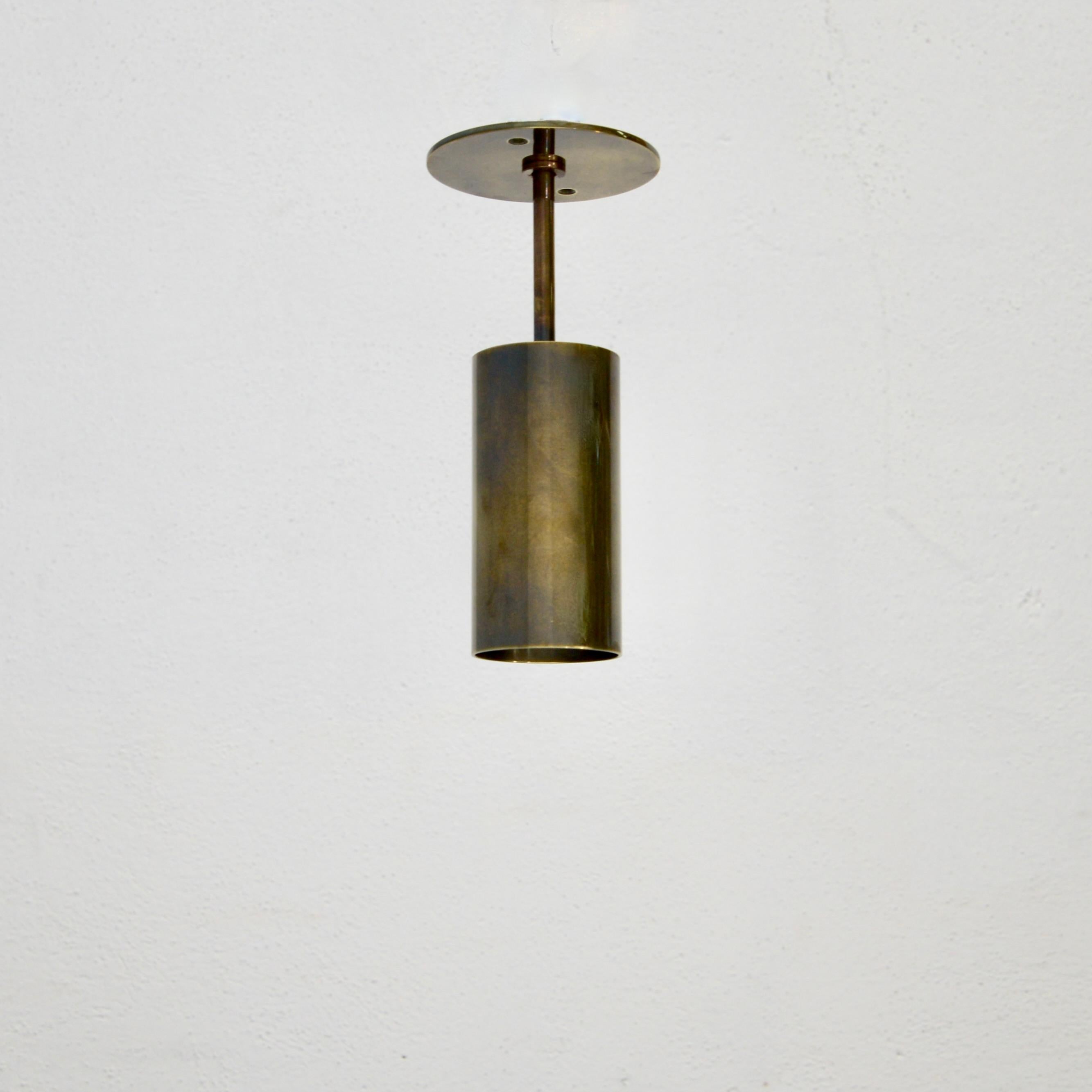 LUzpot is an elegant directional ceiling fixture inspired by classical mid century Italian design. This fixture has a thin stem and rotates and partially angles. Made in solid aged brass, aged nickel or chrome. Wired with 1-E26 medium based socket