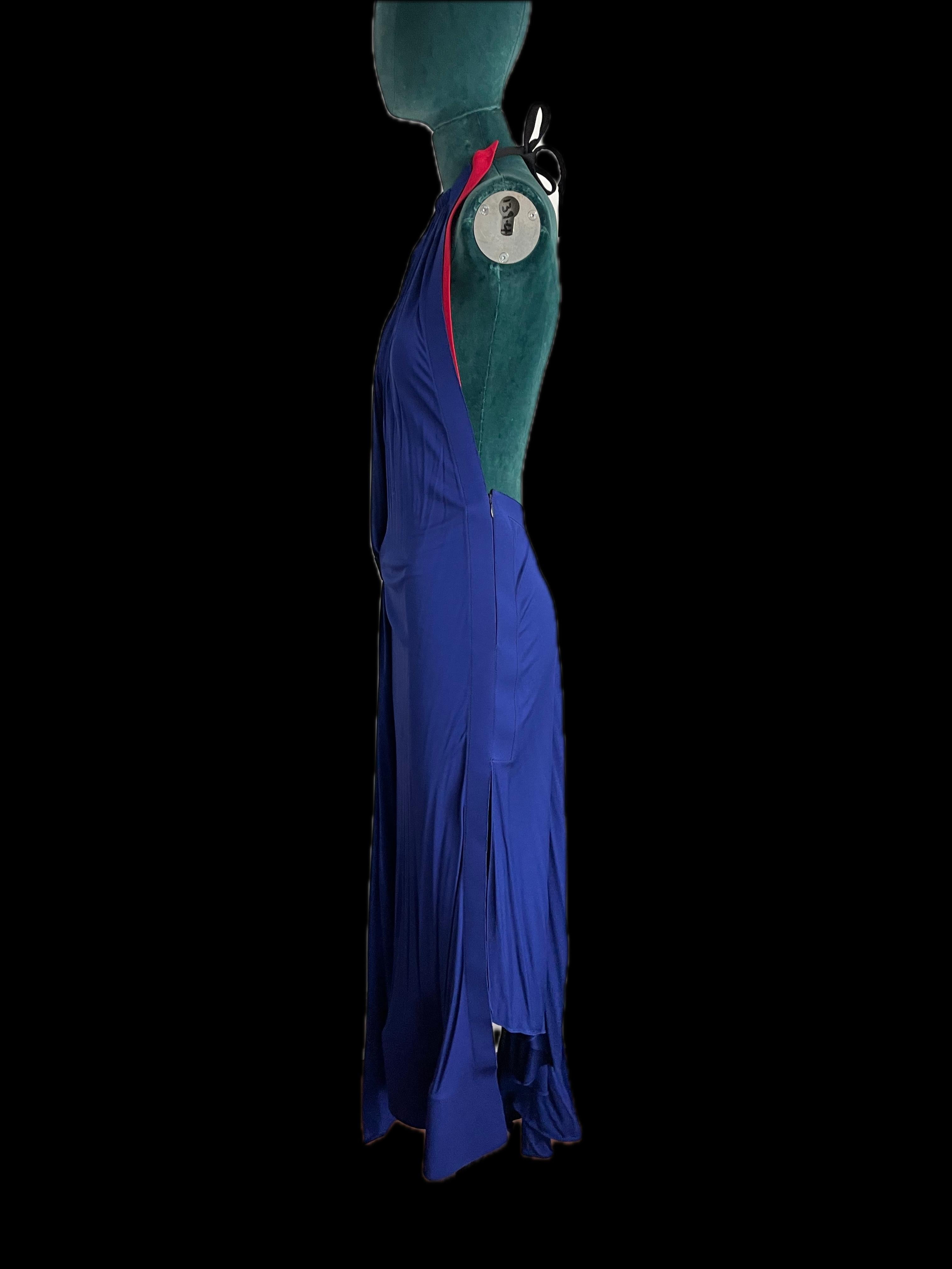 
Introducing the epitome of chic and sophistication: the Louis Vuitton Blue Halter Maxi Dress. This exquisite piece, adorned with luxurious details and crafted to perfection, embodies the essence of timeless elegance and modern style.

The dress