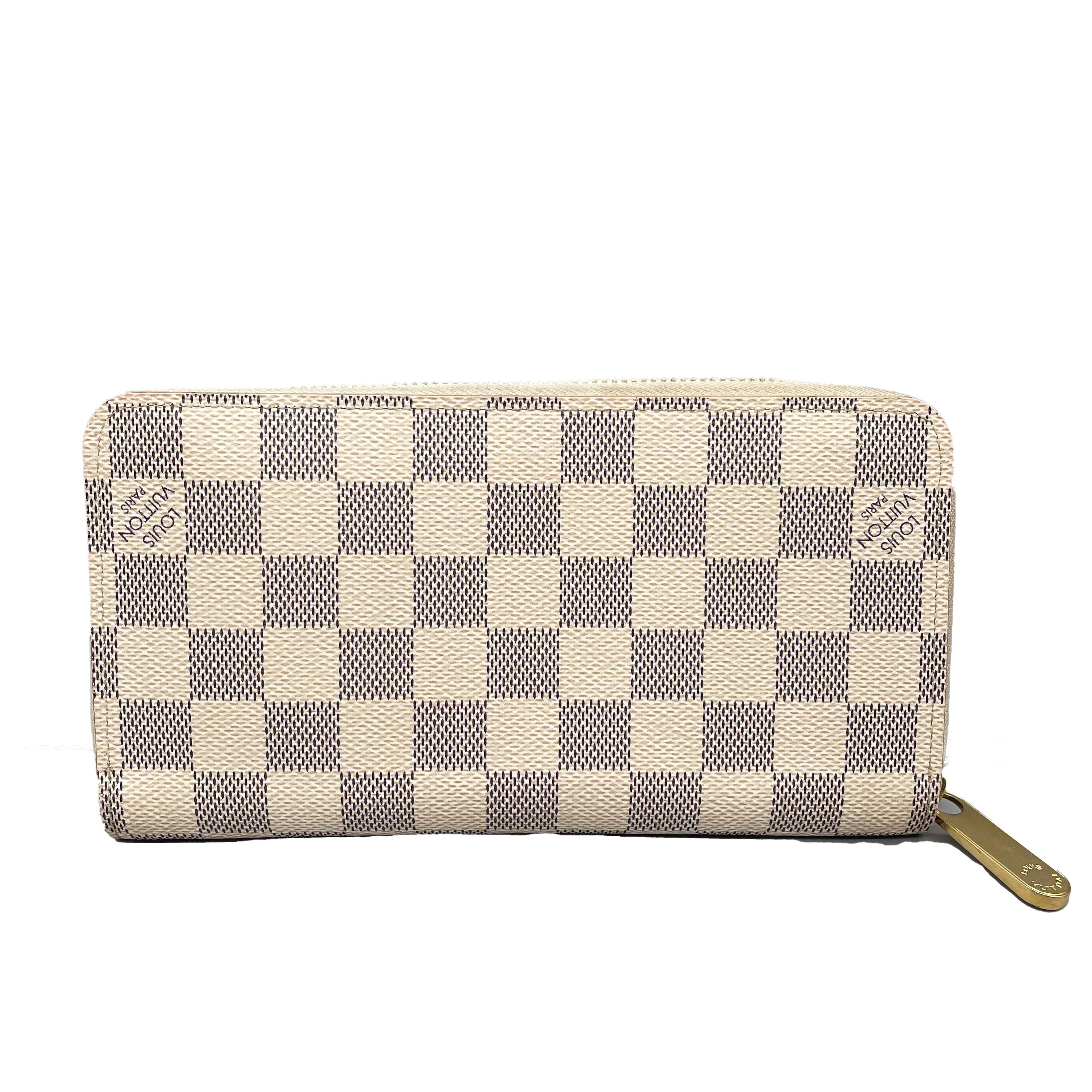 LV Louis Vuitton - Zippy Wallet - Canvas / Leather - Damier Azur / Gold

Description

Damier Azur coated canvas gives a fresh look to Louis Vuitton's iconic Zippy wallet, which is famous for its secure, zip-around format.
Grained cowhide-leather