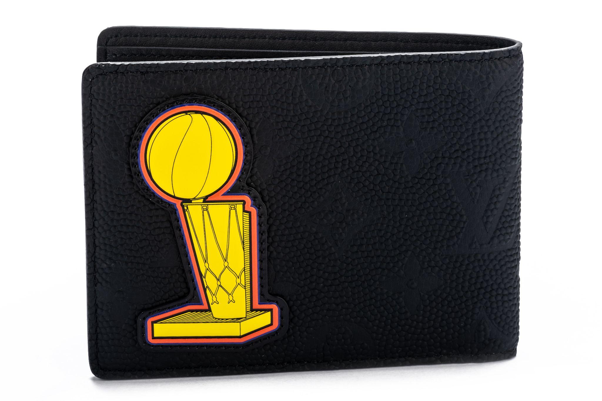 Featuring patches evoking the world of the NBA and basketball championships, this sporty Multiple Wallet is fashioned from Monogram-embossed leather. Its simple but exquisitely crafted interior has several slots for cards, banknotes and receipts.