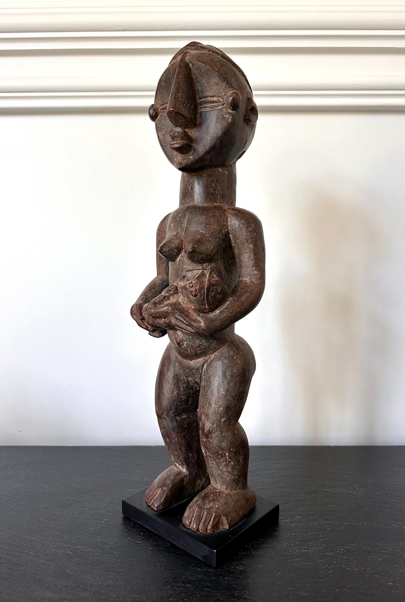 Tribal Lwalwa Mother Figure Holding Baby DR Congo Africa with Provenance For Sale