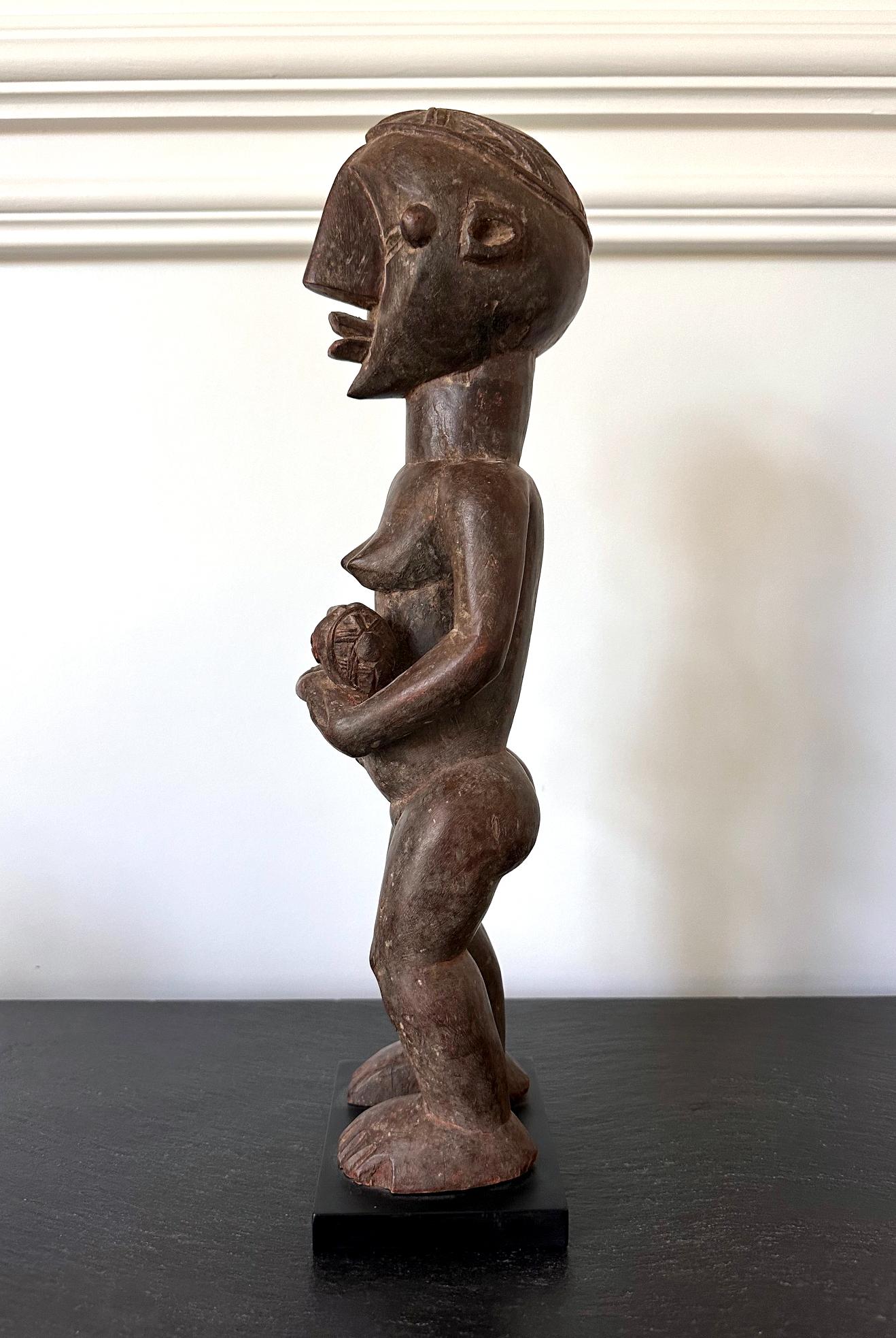 Congolese Lwalwa Mother Figure Holding Baby DR Congo Africa with Provenance For Sale