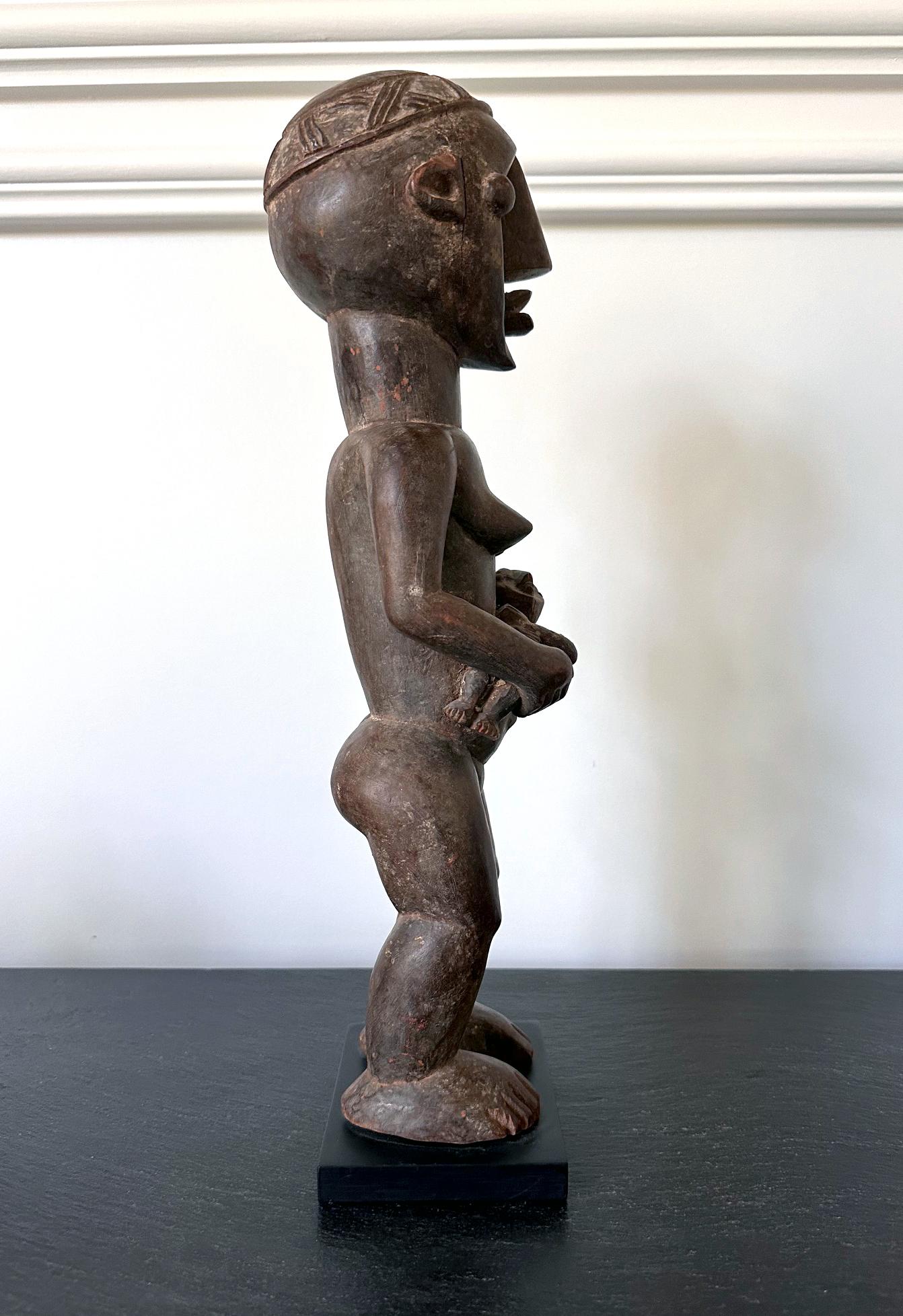 20th Century Lwalwa Mother Figure Holding Baby DR Congo Africa with Provenance For Sale