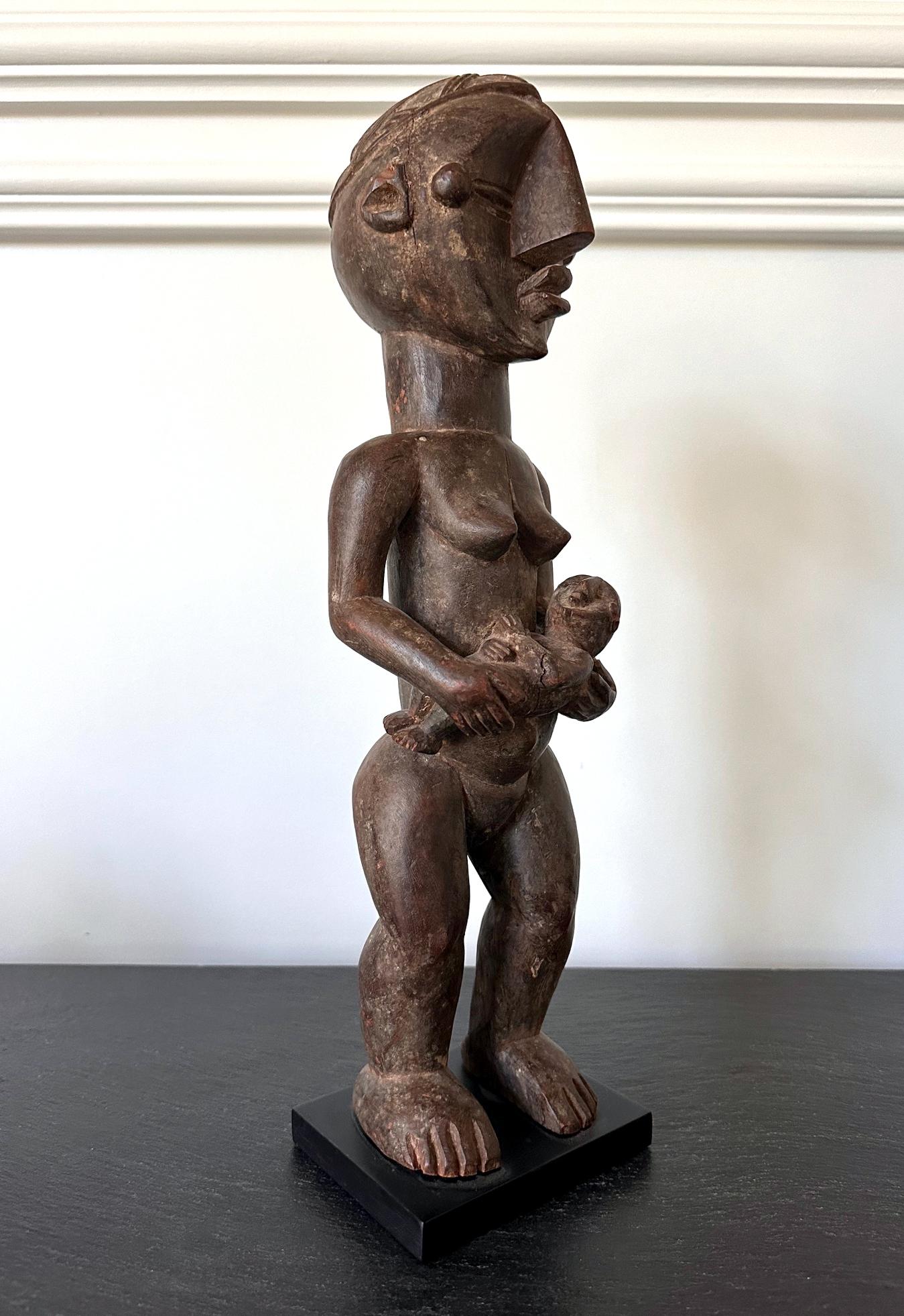 Wood Lwalwa Mother Figure Holding Baby DR Congo Africa with Provenance For Sale