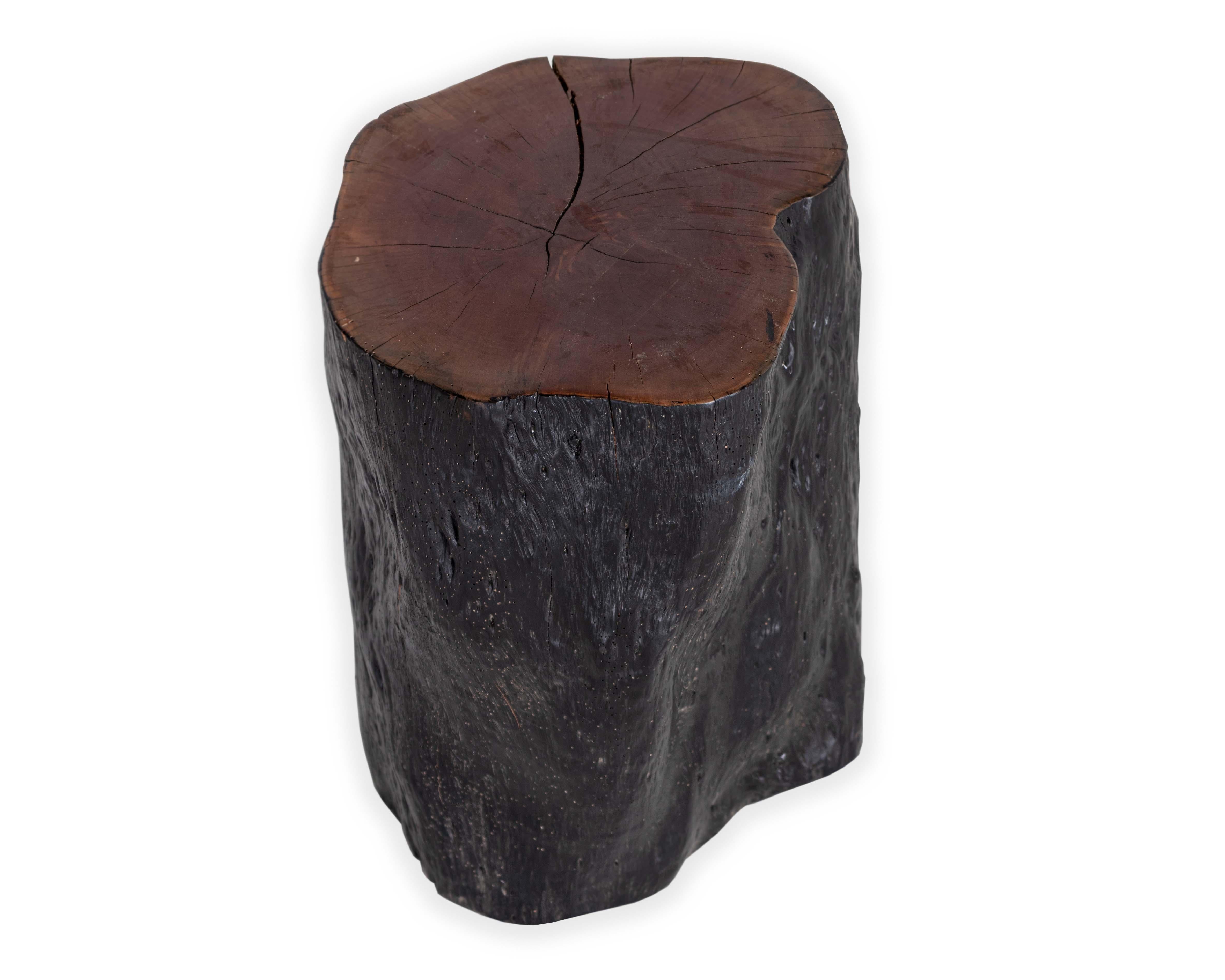 Lychee wood stump end table. 

Piece from our one of a kind Le Monde collection. Exclusive to Brendan Bass. 


