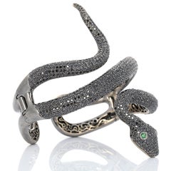 Bracciale a serpente in oro 18 carati con diamante e granato Lydia Courteille