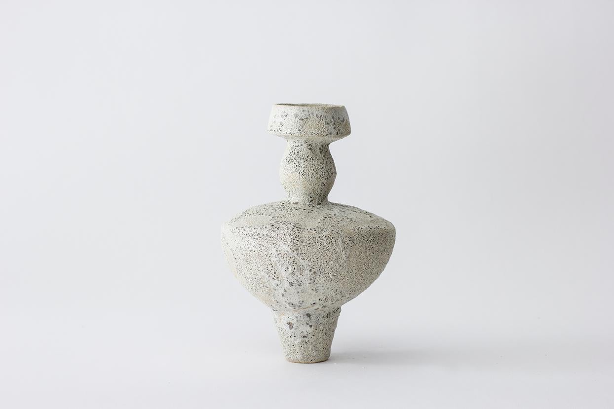 Cálpide granito stoneware vase by Raquel Vidal and Pedro Paz
Dimensions: 24 x 16 cm
Materials: Hand-sculpted, glazed pottery

The pieces are hand built white stoneware with grog, and brushed with experimental glazes mix and textured surface,