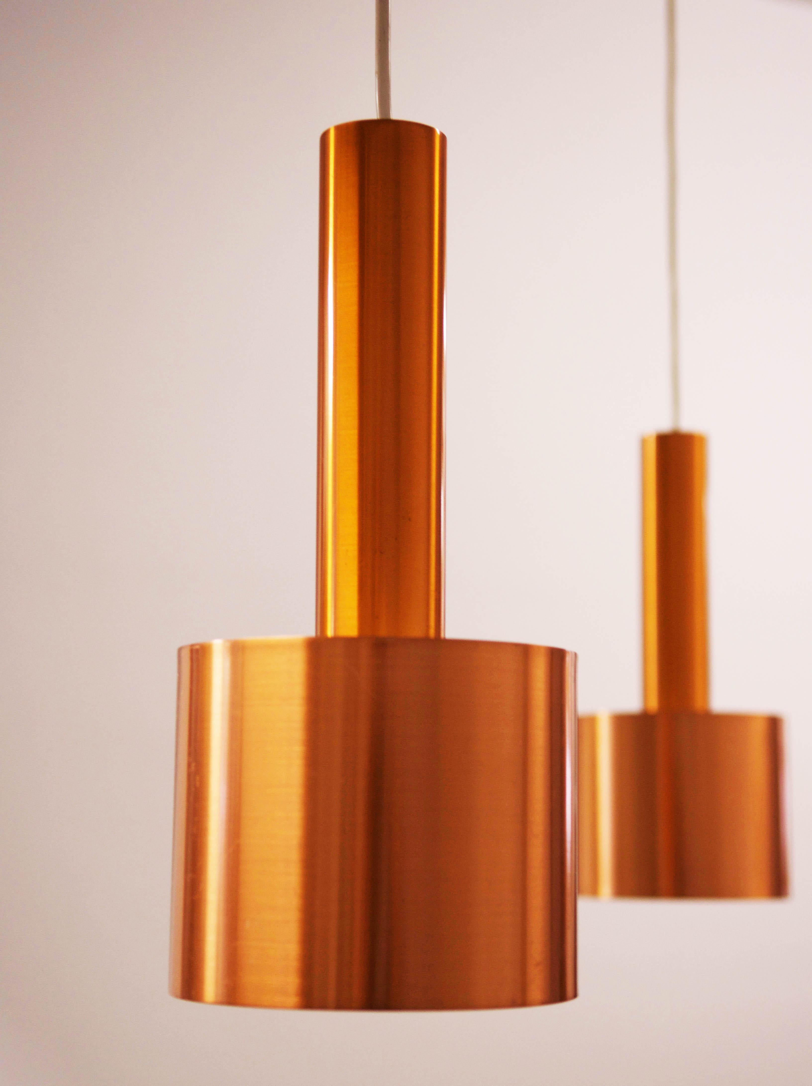 Copper pendant bell form fitted with one E27 socket. Made by Lyfa in Denmark in the 1960s.