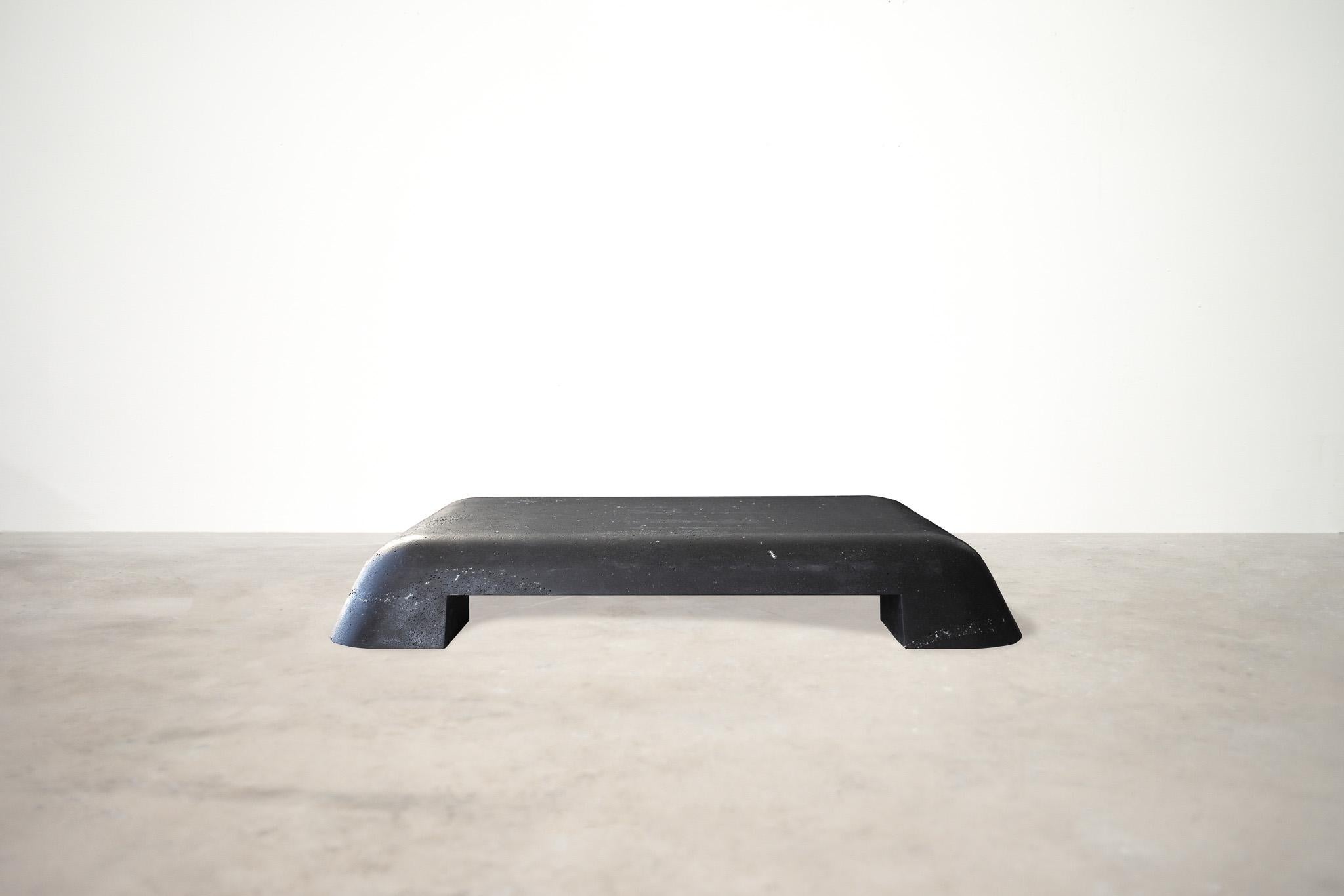 Lyft Table by Lucas Tyra Morten
2022
Limited edition of 6
Dimensions: W 128 x D 96 x H 18 cm
Material: Icelandic basalt stone

Occupying the liminal space between art and design, the multidisciplinary atelier of Lucas and Tyra Morten is a small