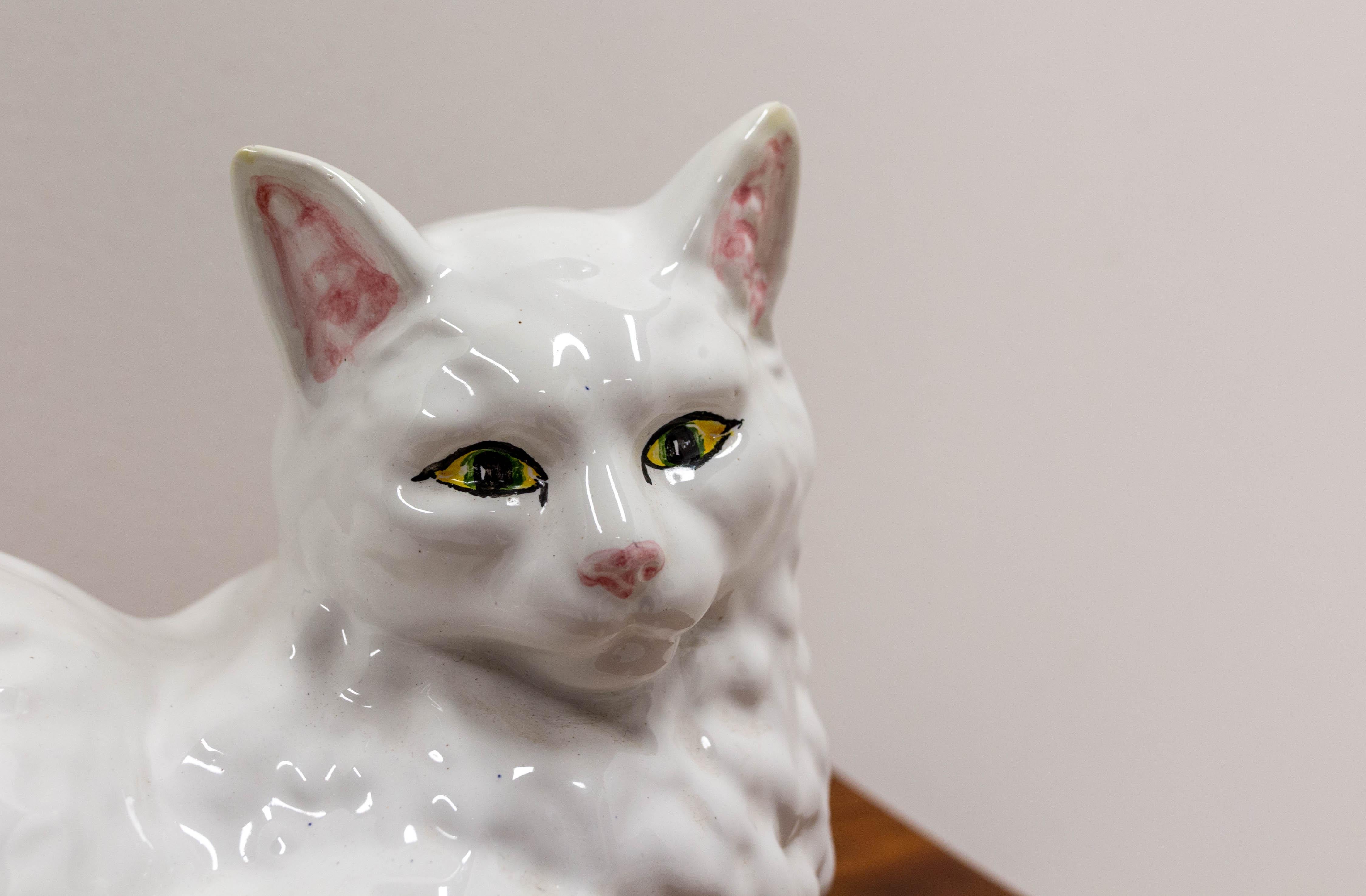 lying cat statue