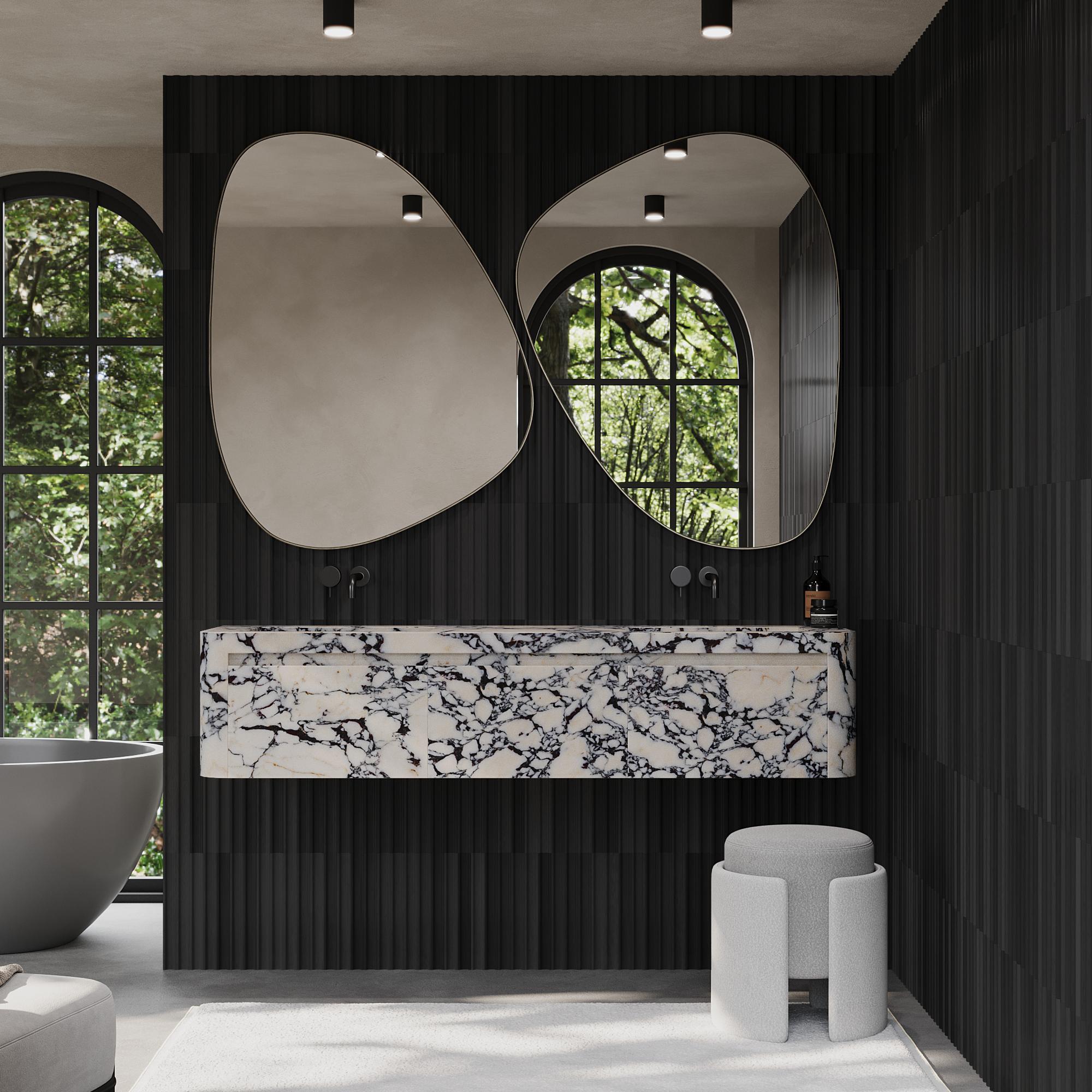 Notre meuble-lavabo flottant Lyke à double vasque présente un magnifique marbre veiné qui ajoute de la profondeur et du caractère à l'esthétique de votre salle de bains. L'extérieur est entièrement fabriqué en marbre de première qualité, et