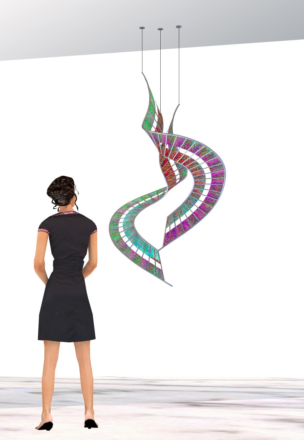 ASCENDING HELIX exhibits a spiral geometry and can be suspended from a ceiling or ground mounted to a tension bar and floor base.   The two types of textured dichroic glass change color with point of view and ambient lighting.  Magenta to green and