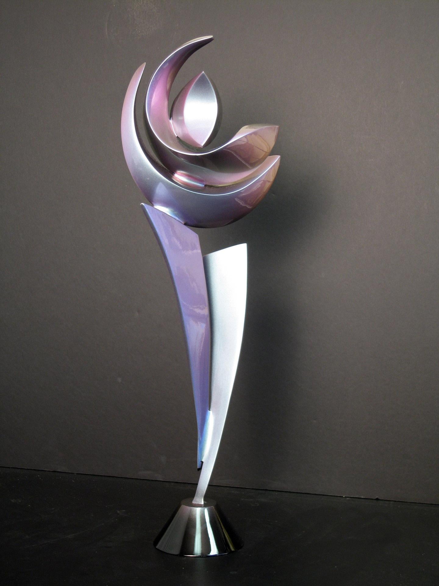 5 unique forms combine in this sculpture in a style best described as anthropomorphic abstraction.  This is an edition of 12 and is also available with a color shift paint seen in the last two images.