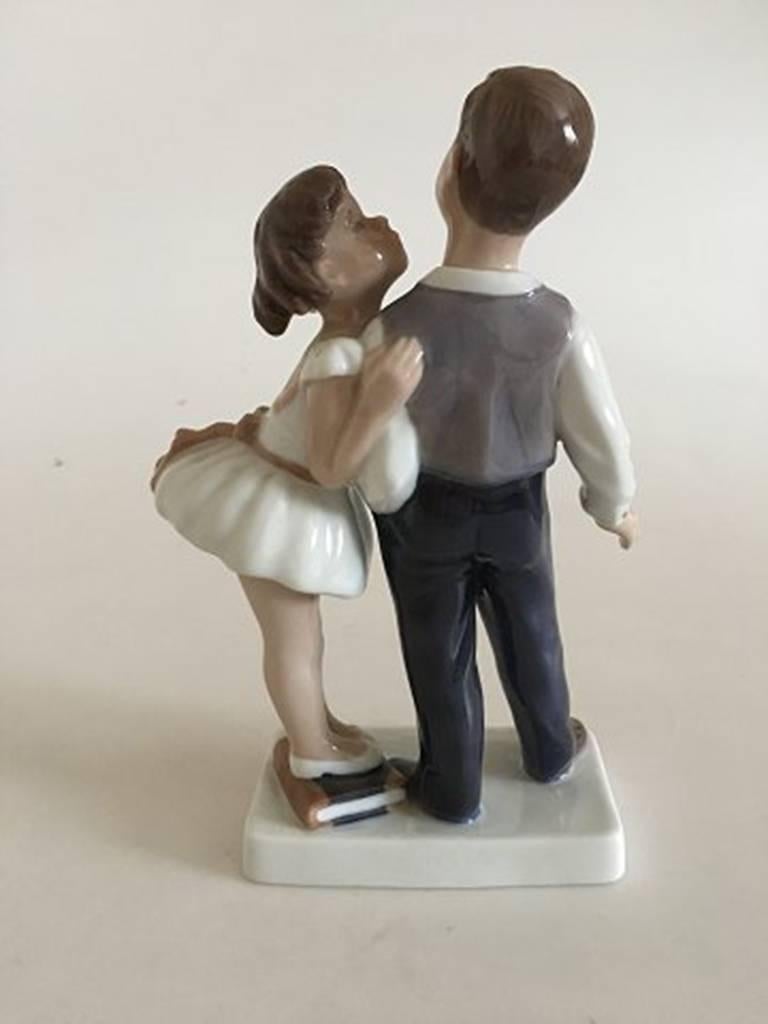 lladro boy and girl on bench