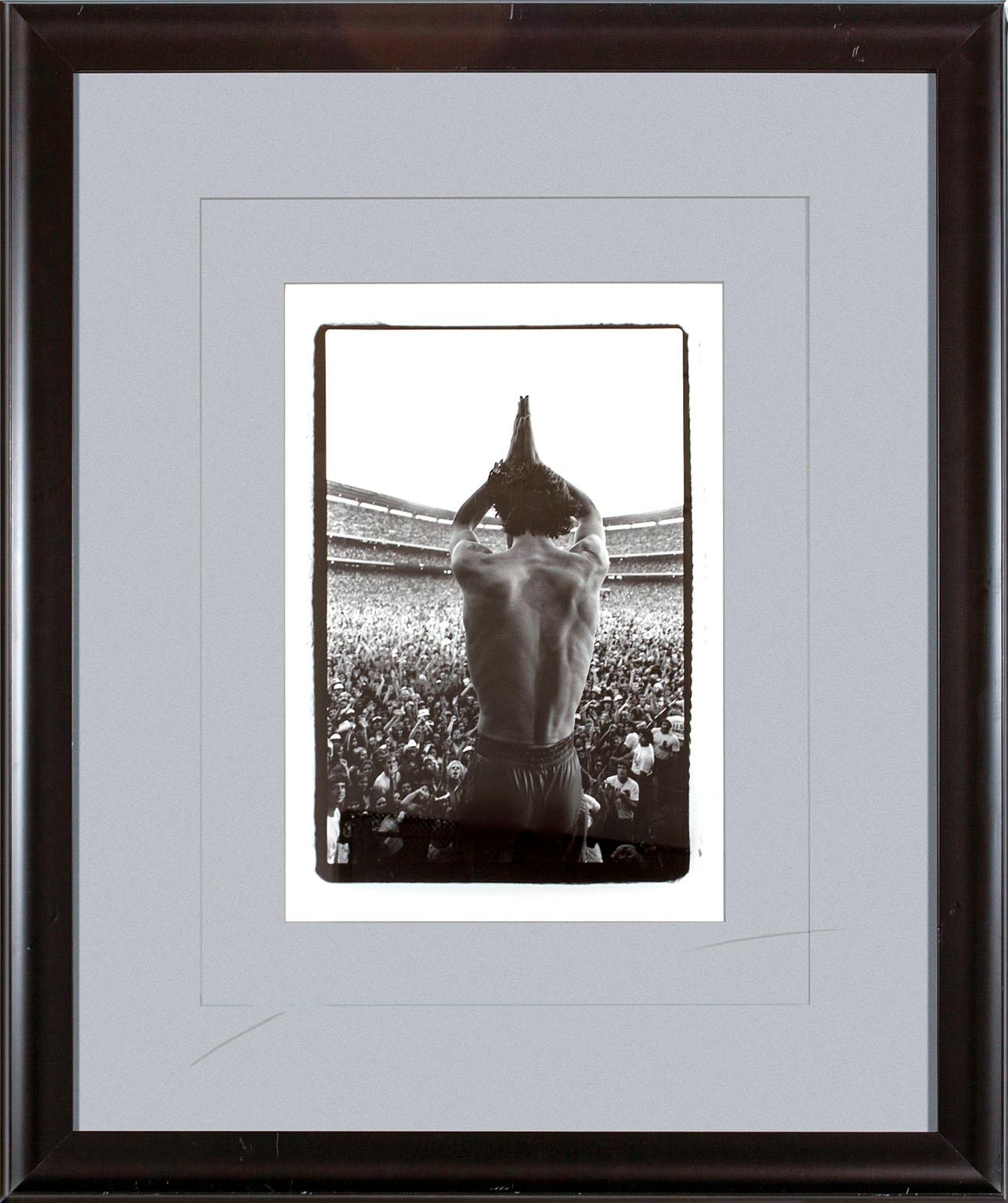 "Mick Jagger 'The Back'" framed black and white photograph by Lynn Goldsmith. Image size: 16 1/2 x 11 inches. This photograph was previously displayed in a guest room of the original Hard Rock Hotel and Casino in Las Vegas, Nevada, and comes with a